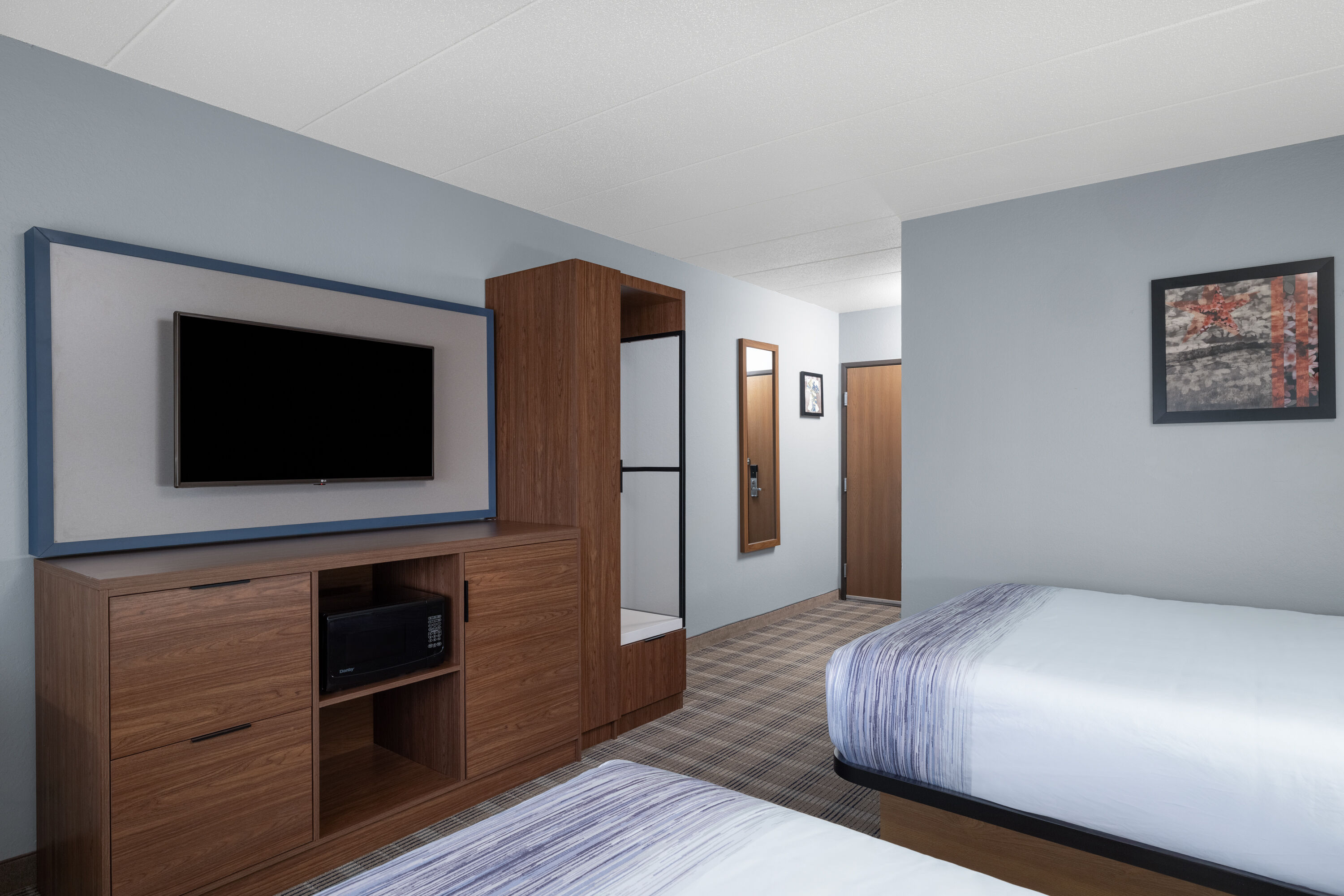 Guest room at the AmericInn by Wyndham Baldwin in Baldwin, Wisconsin