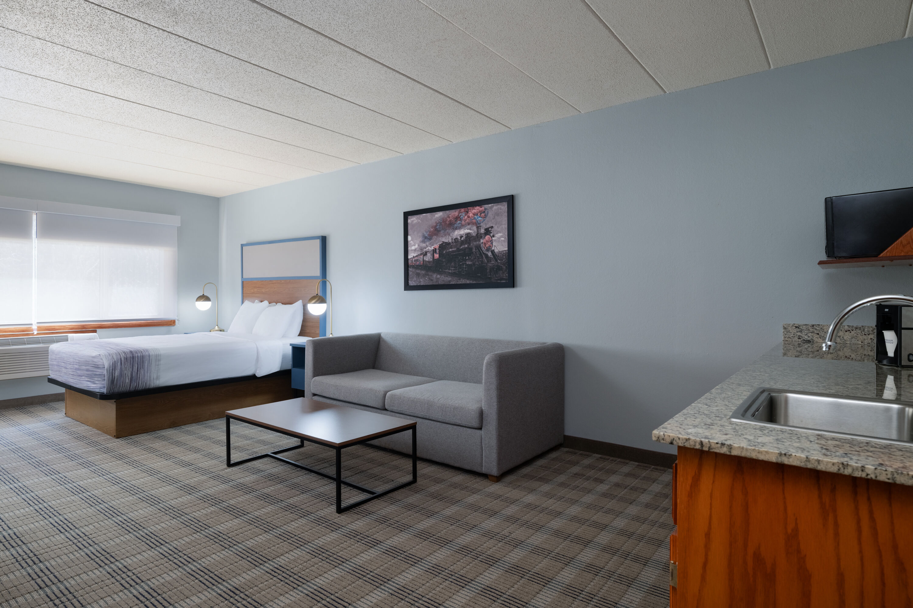 Guest room at the AmericInn by Wyndham Baldwin in Baldwin, Wisconsin
