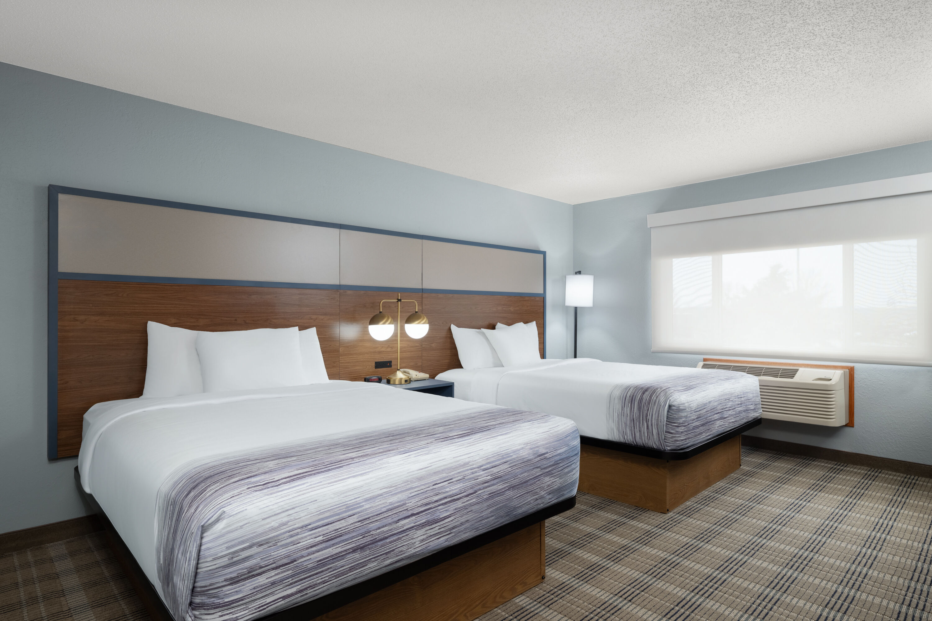Guest room at the AmericInn by Wyndham Baldwin in Baldwin, Wisconsin