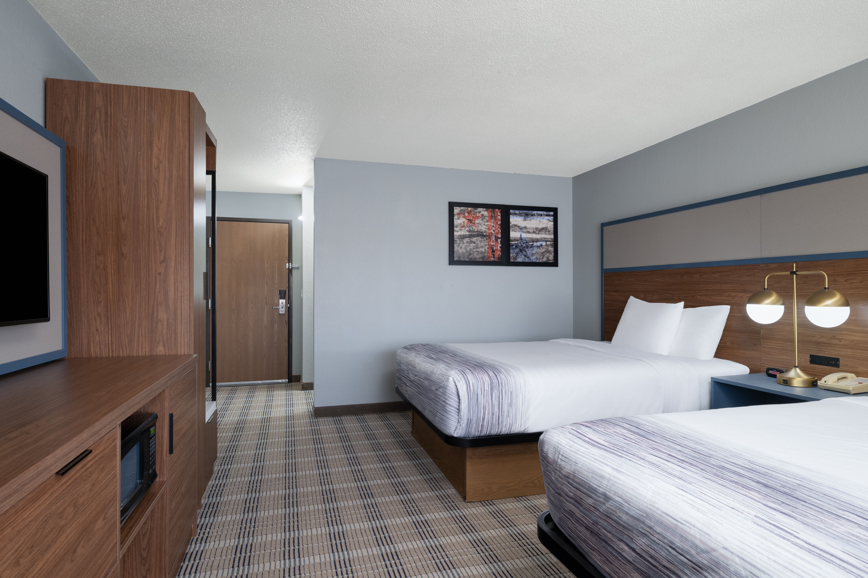 Guest room at the AmericInn by Wyndham Baldwin in Baldwin, Wisconsin