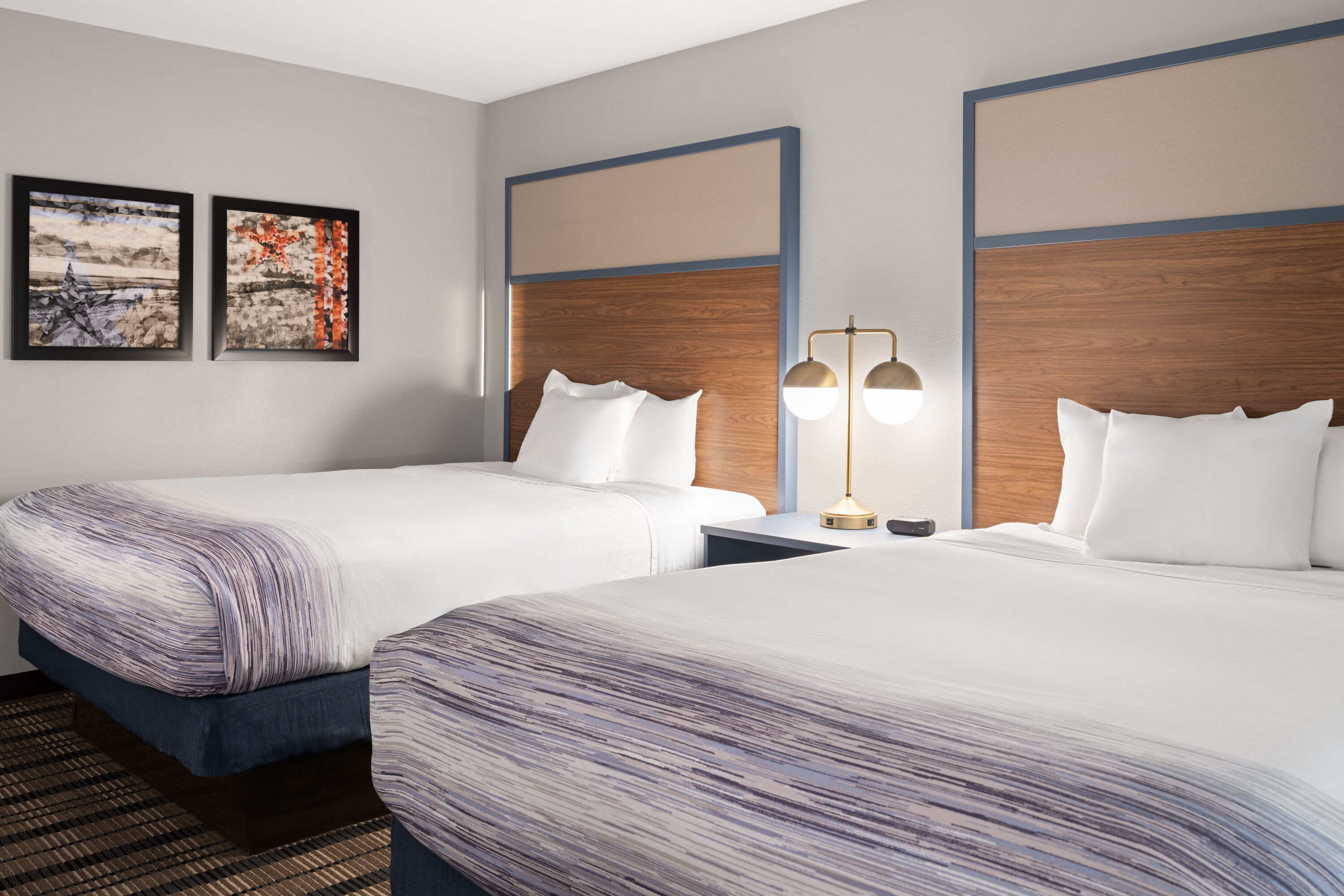 Guest room at the AmericInn by Wyndham Beaver Dam in Beaver Dam, Wisconsin