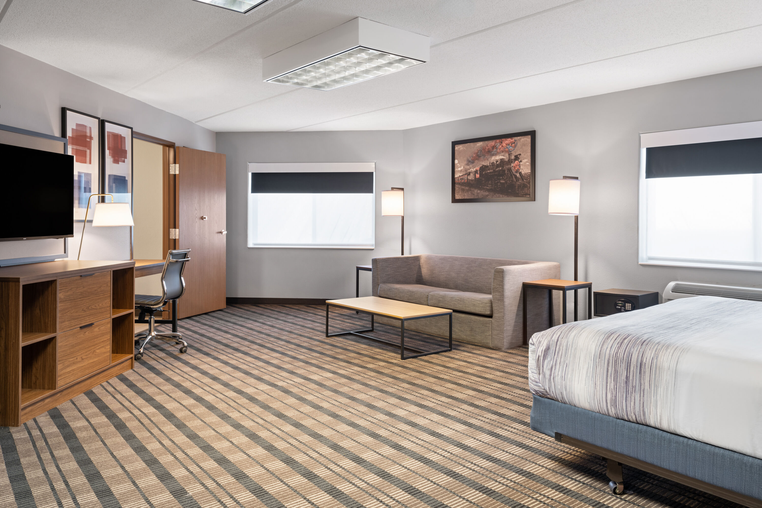 Guest room at the AmericInn by Wyndham Beaver Dam in Beaver Dam, Wisconsin