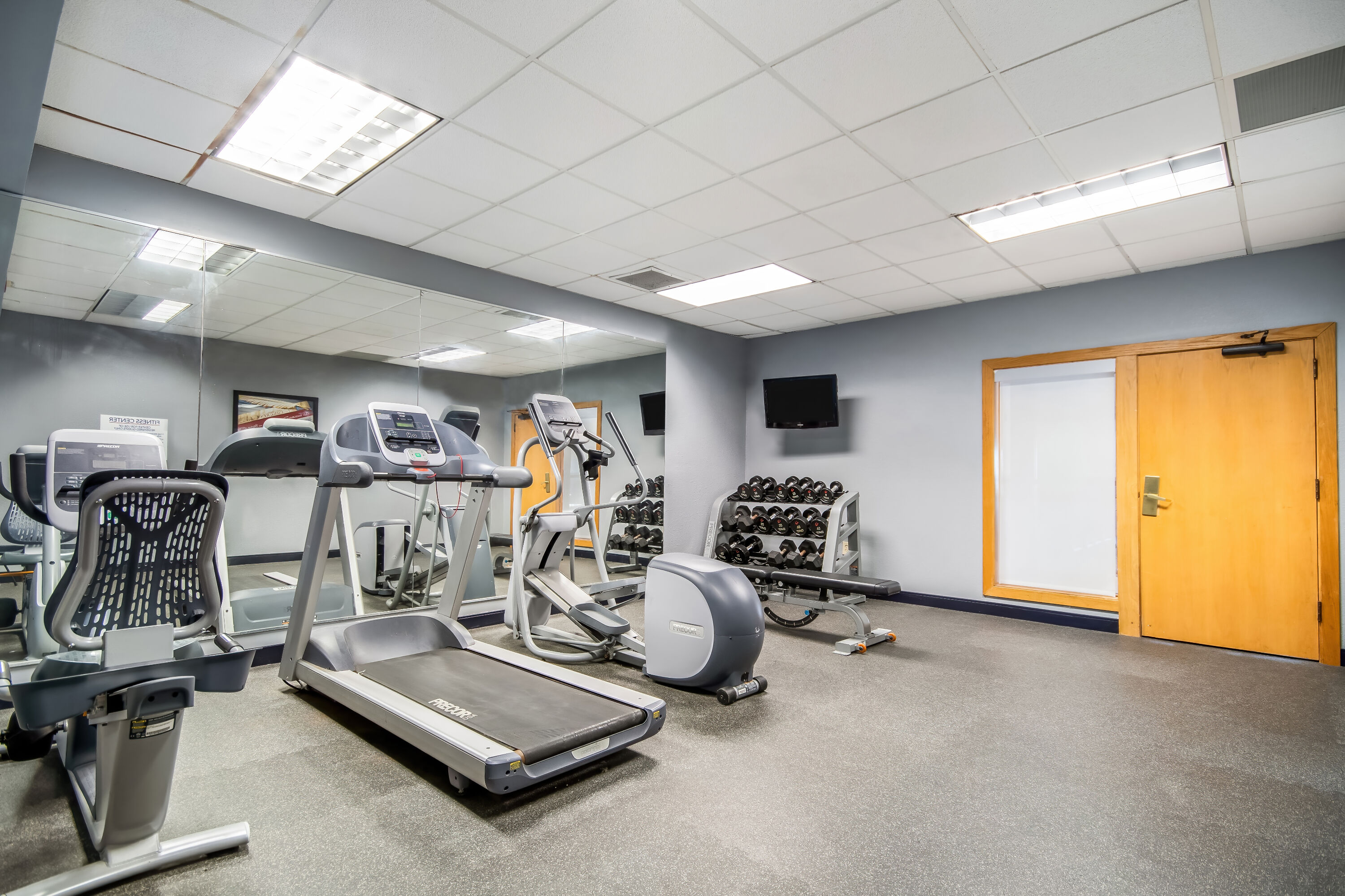 Fitness room at AmericInn by Wyndham Beloit in Beloit, Wisconsin