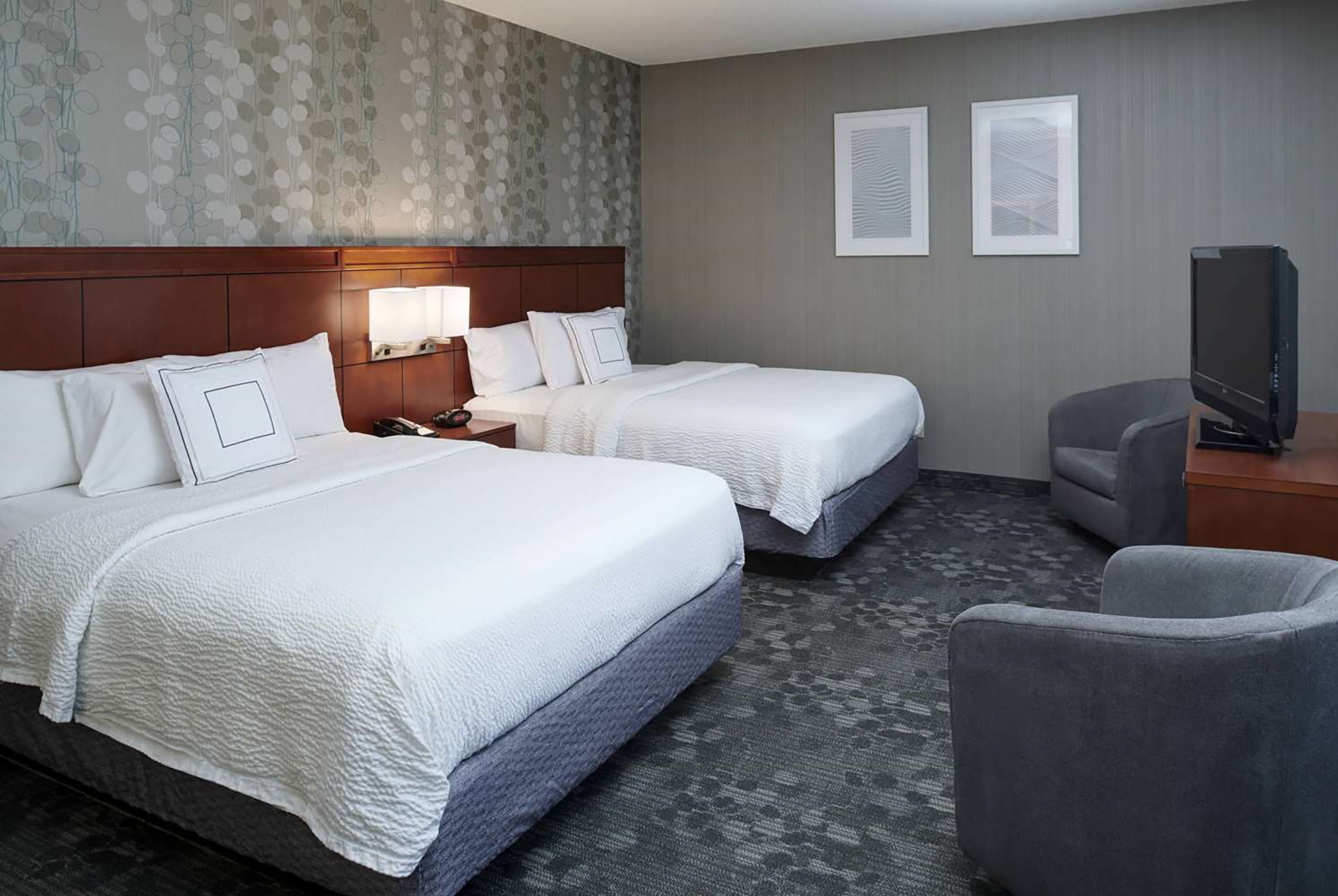 Guest room at the AmericInn by Wyndham Brookfield in Brookfield, Wisconsin