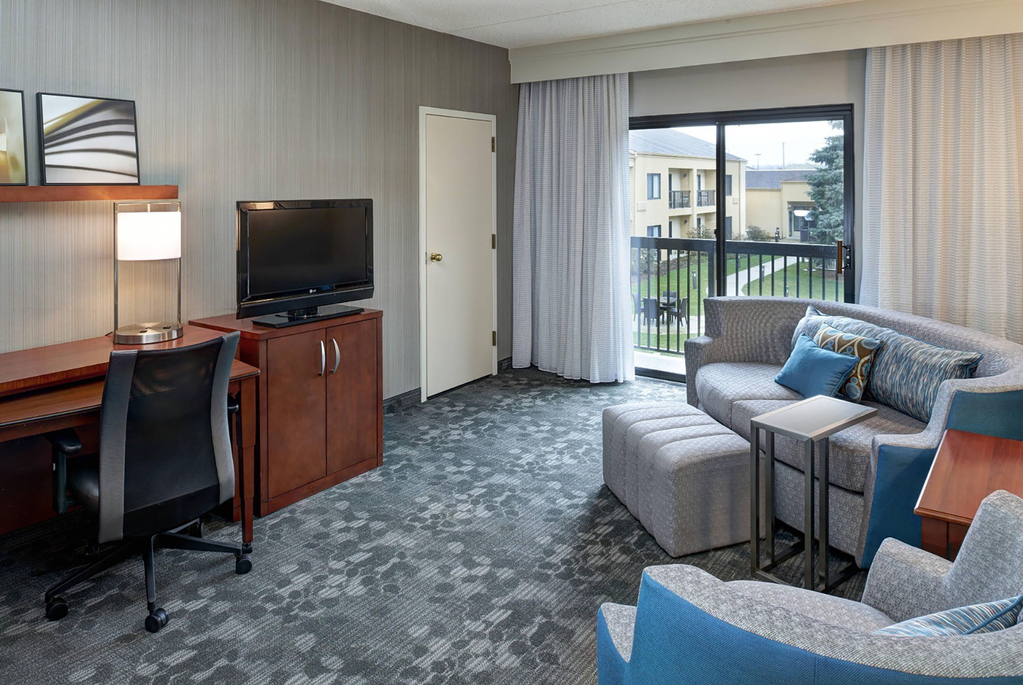 Guest room at the AmericInn by Wyndham Brookfield in Brookfield, Wisconsin