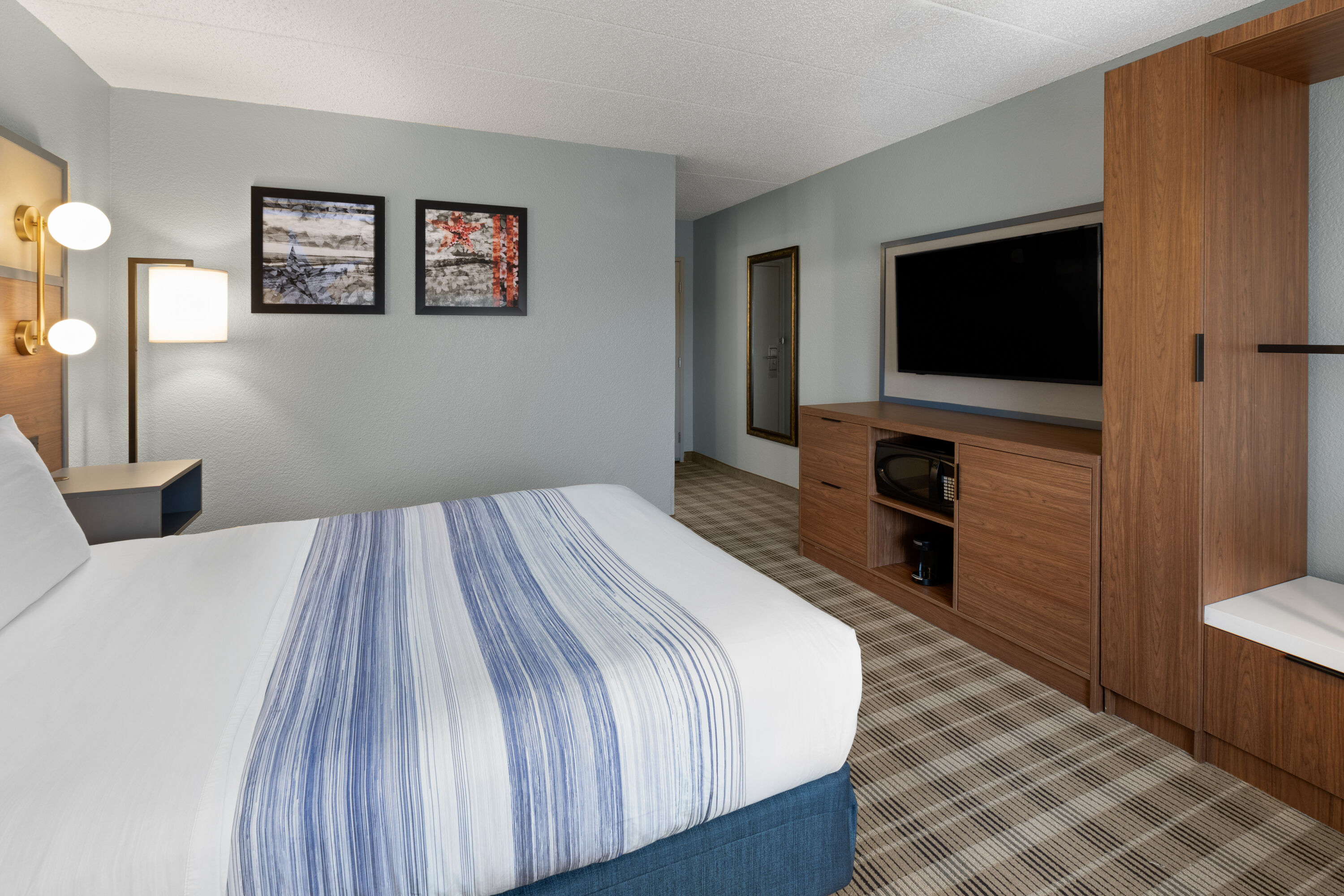 Guest room at the AmericInn by Wyndham Chippewa Falls in Chippewa Falls, Wisconsin