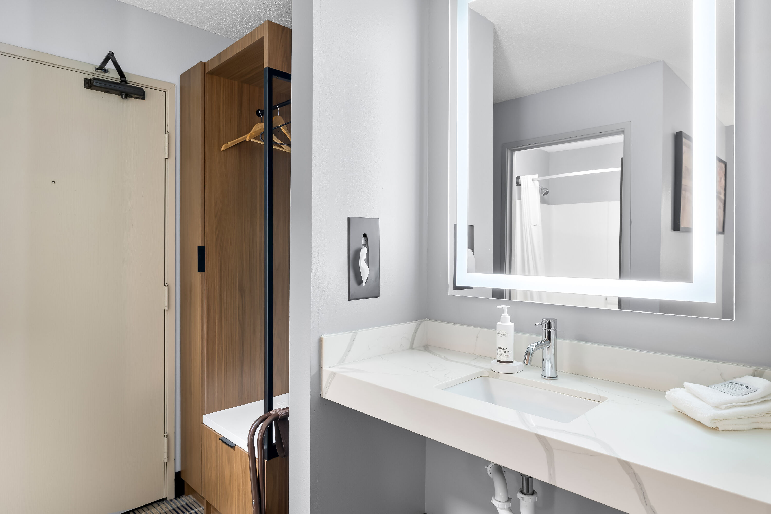 Guest room bath at the AmericInn by Wyndham Columbus Wisconsin in Columbus, Wisconsin