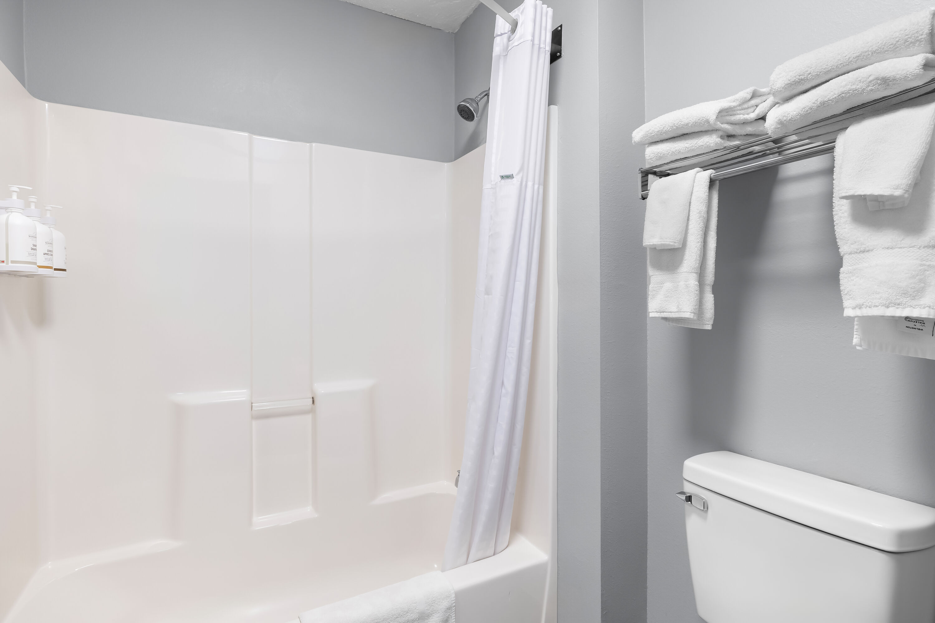 Guest room bath at the AmericInn by Wyndham Columbus Wisconsin in Columbus, Wisconsin