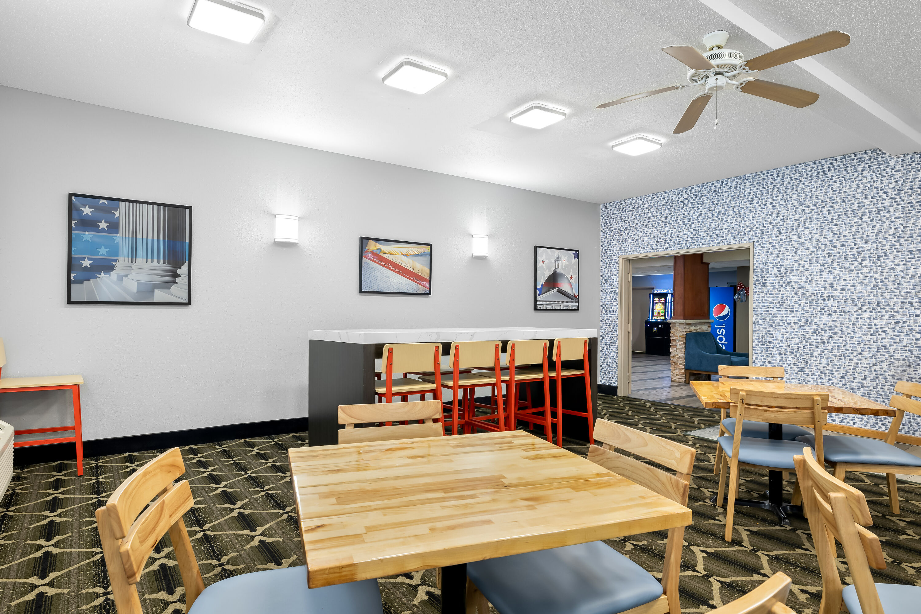 AmericInn by Wyndham Columbus Wisconsin restaurant breakfast area with seating in Columbus, Wisconsin