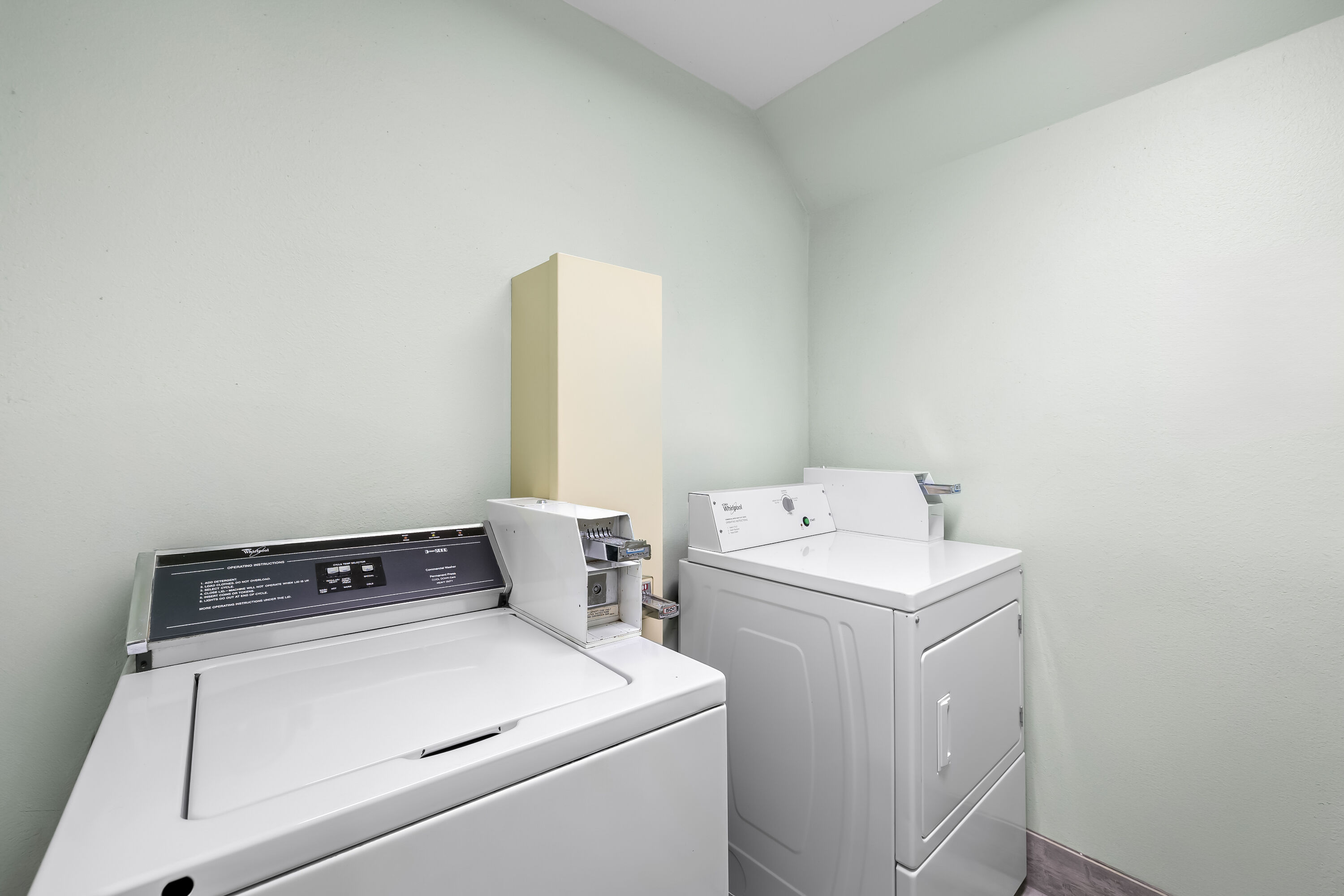 Laundry facilities at AmericInn by Wyndham Columbus Wisconsin in Columbus, Wisconsin