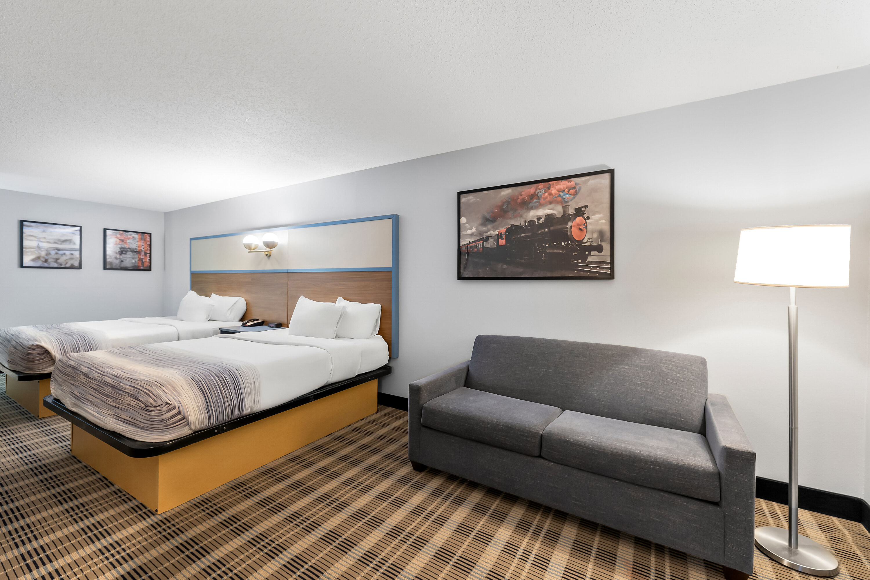 Double bed guest room at the AmericInn by Wyndham Columbus Wisconsin in Columbus, Wisconsin