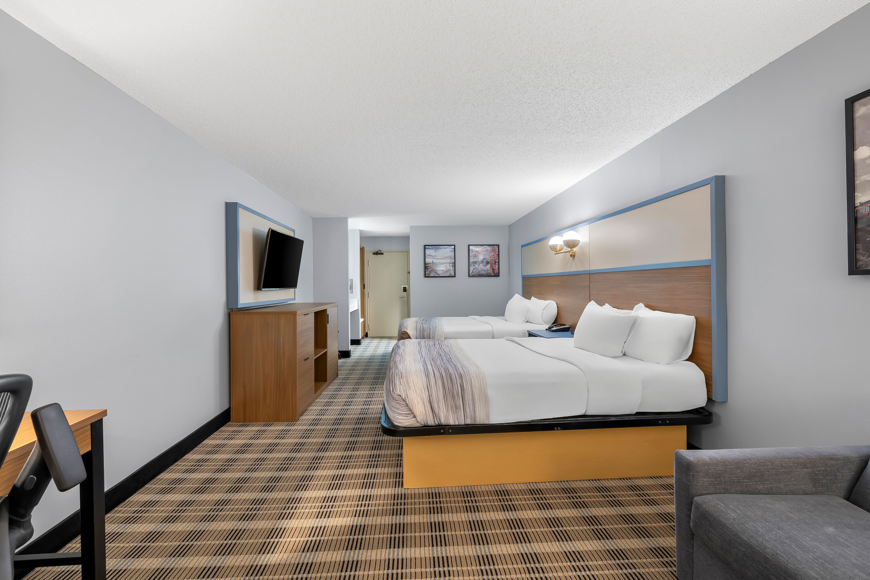 Double bed guest room at the AmericInn by Wyndham Columbus Wisconsin in Columbus, Wisconsin