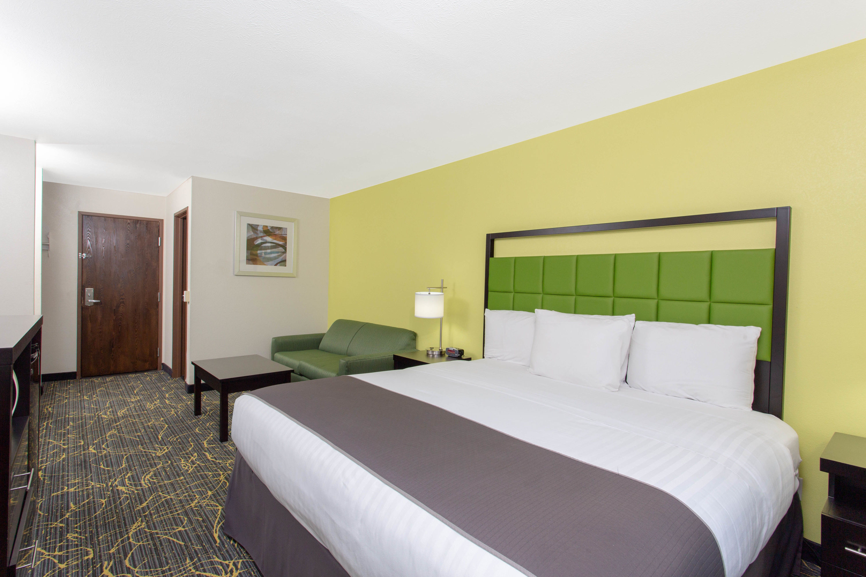 Guest room at the AmericInn by Wyndham Delafield in Delafield, Wisconsin