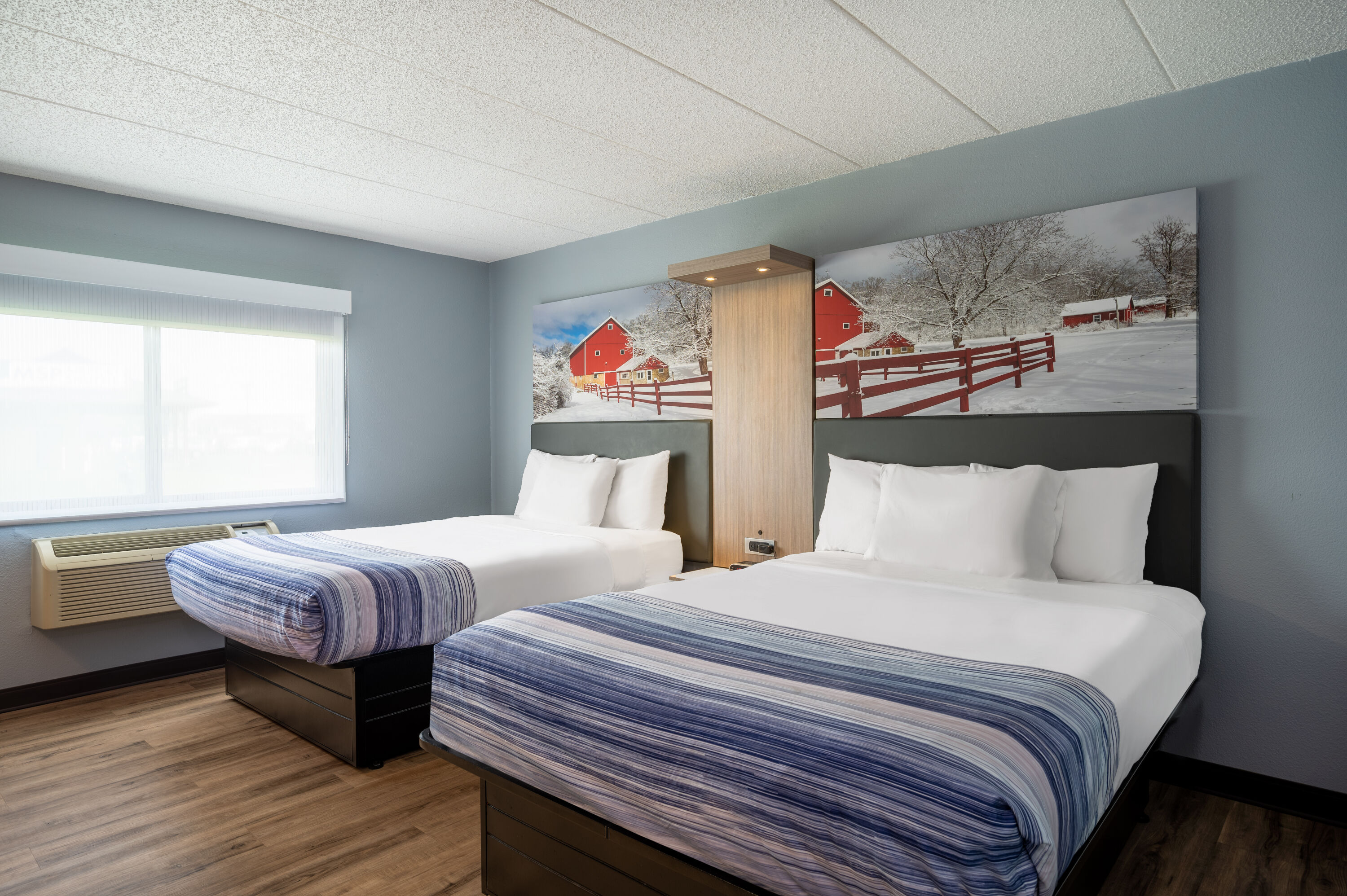 Guest room at the AmericInn by Wyndham Eau Claire in Eau Claire, Wisconsin