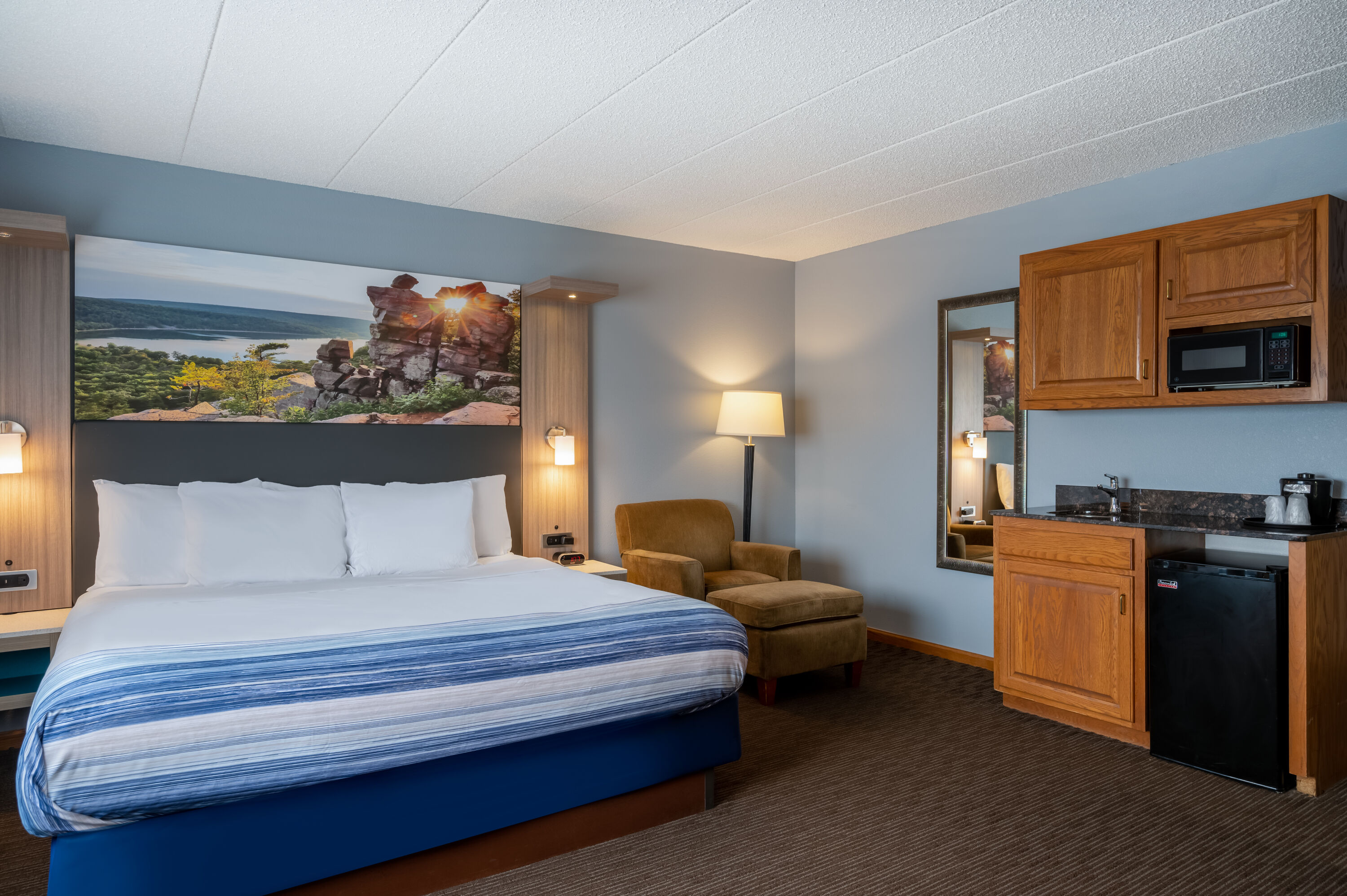 Guest room at the AmericInn by Wyndham Eau Claire in Eau Claire, Wisconsin