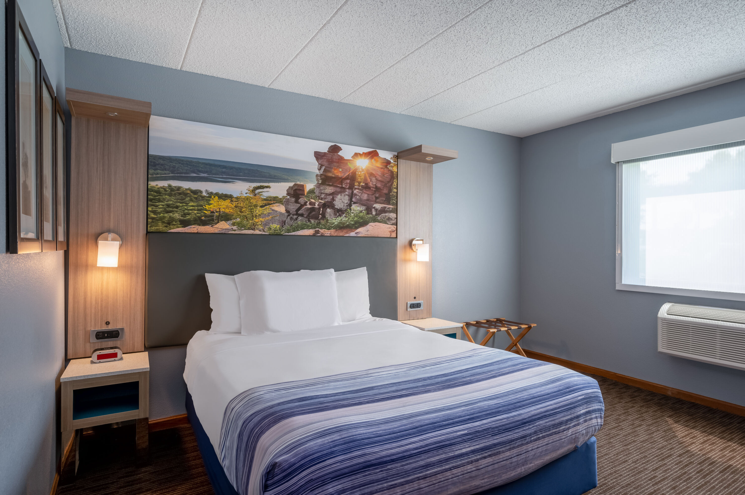 Guest room at the AmericInn by Wyndham Eau Claire in Eau Claire, Wisconsin