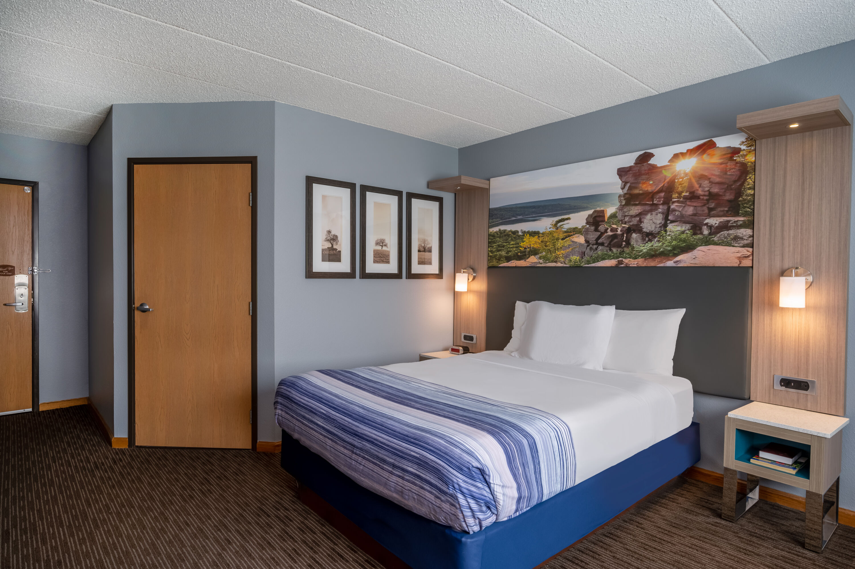 Guest room at the AmericInn by Wyndham Eau Claire in Eau Claire, Wisconsin