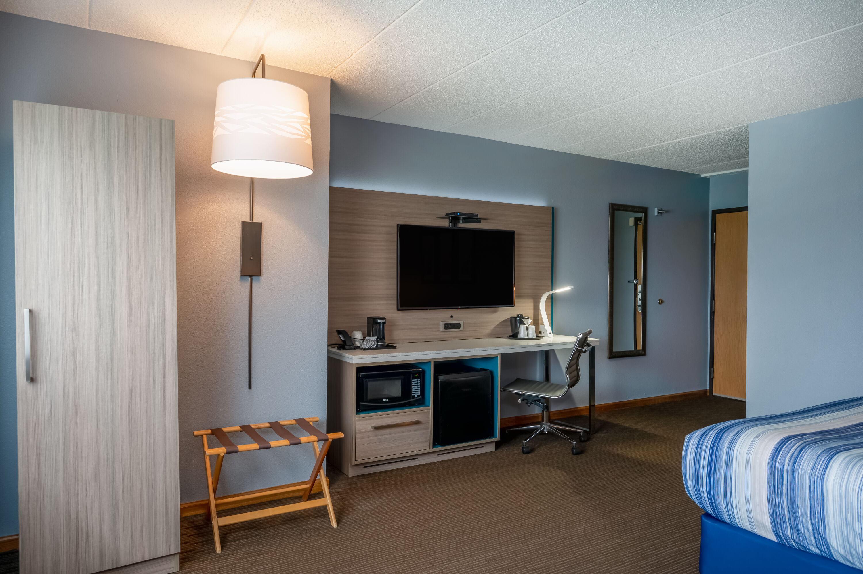 Guest room at the AmericInn by Wyndham Eau Claire in Eau Claire, Wisconsin