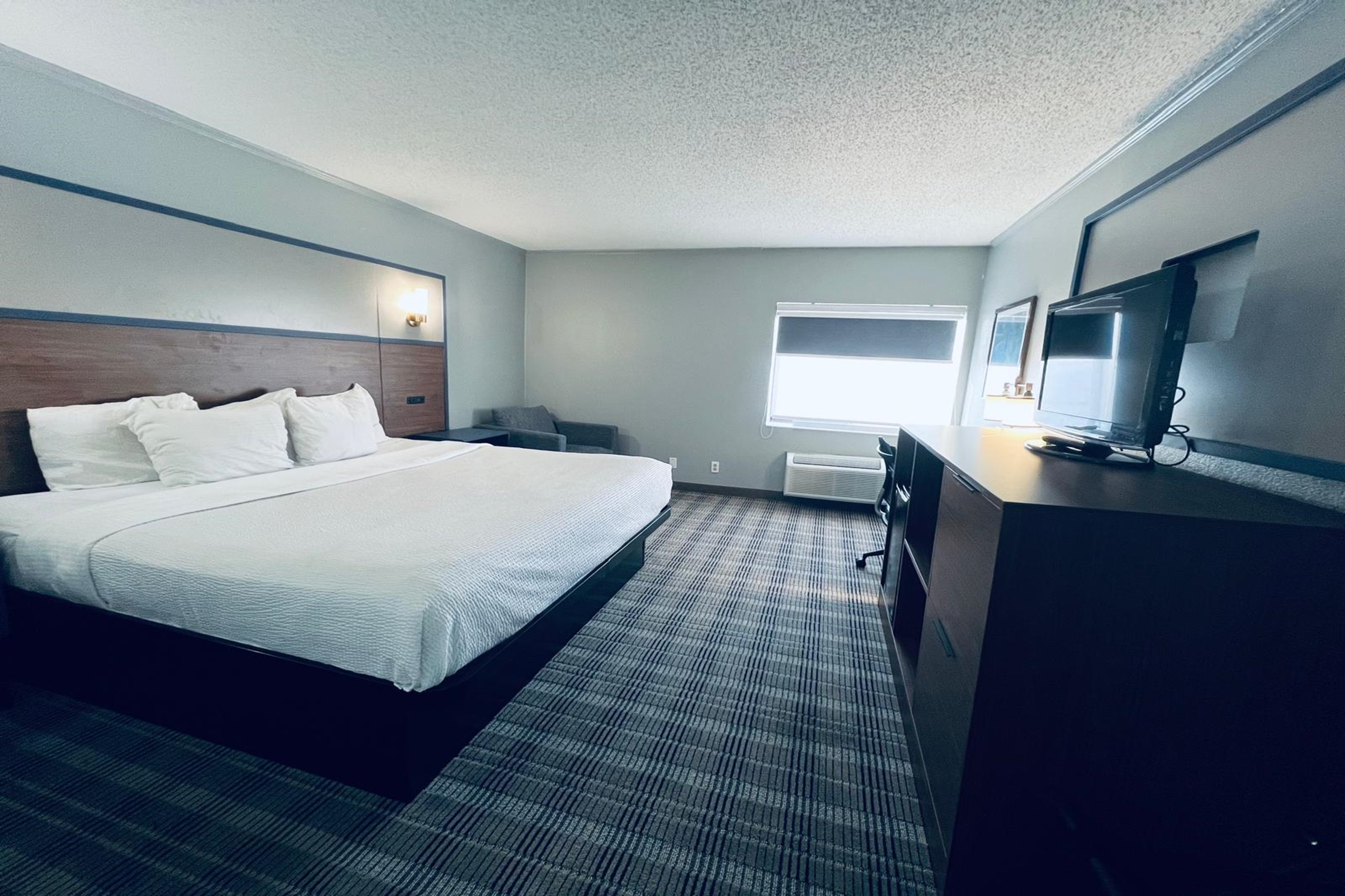 Guest room at the AmericInn by Wyndham Glendale/Milwaukee in Glendale, Wisconsin