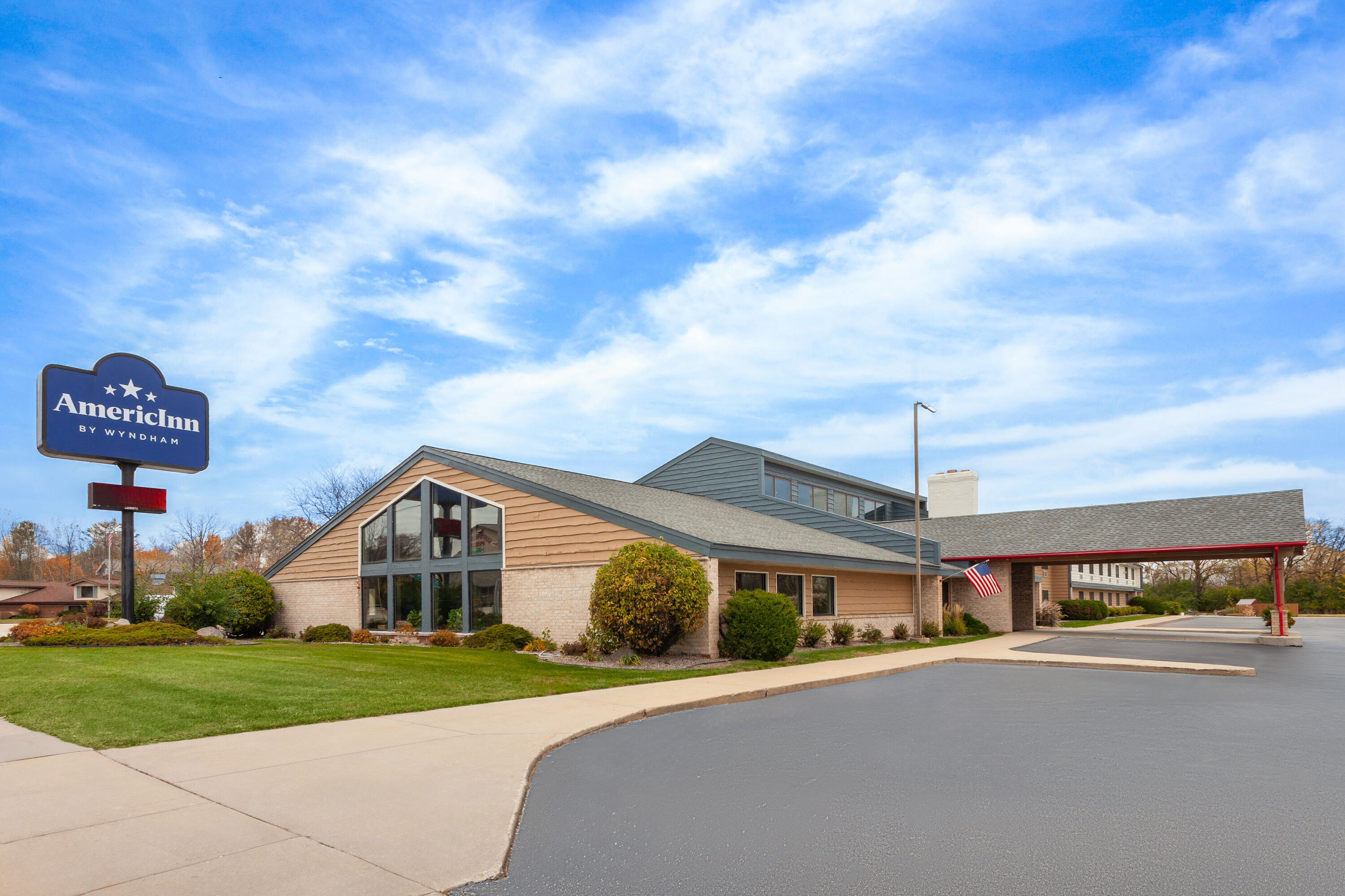 Exterior Day Image of AmericInn by Wyndham Green Bay West hotel in Green Bay, Wisconsin
