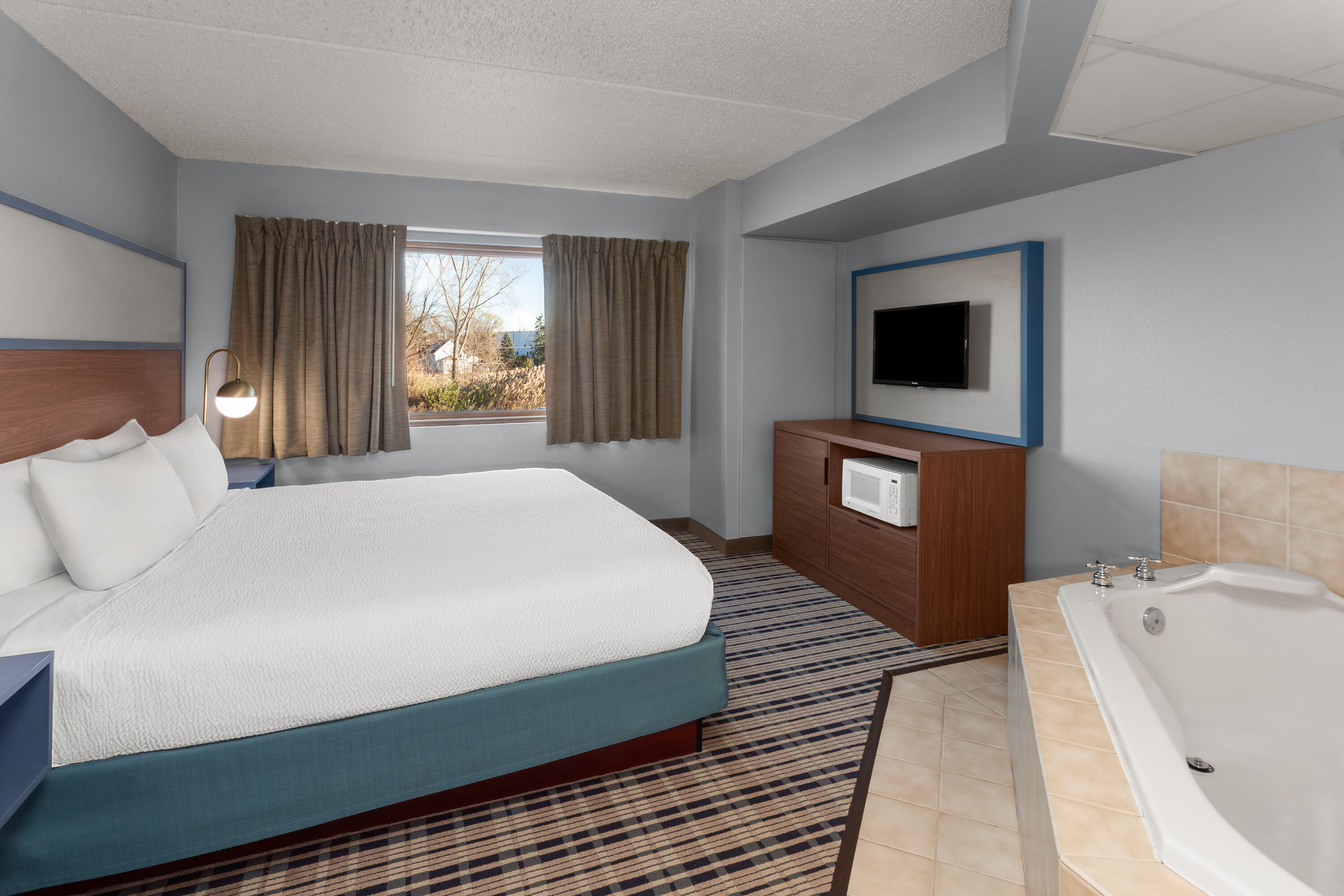 AmericInn by Wyndham Green Bay West hot tub suite in Green Bay, Wisconsin