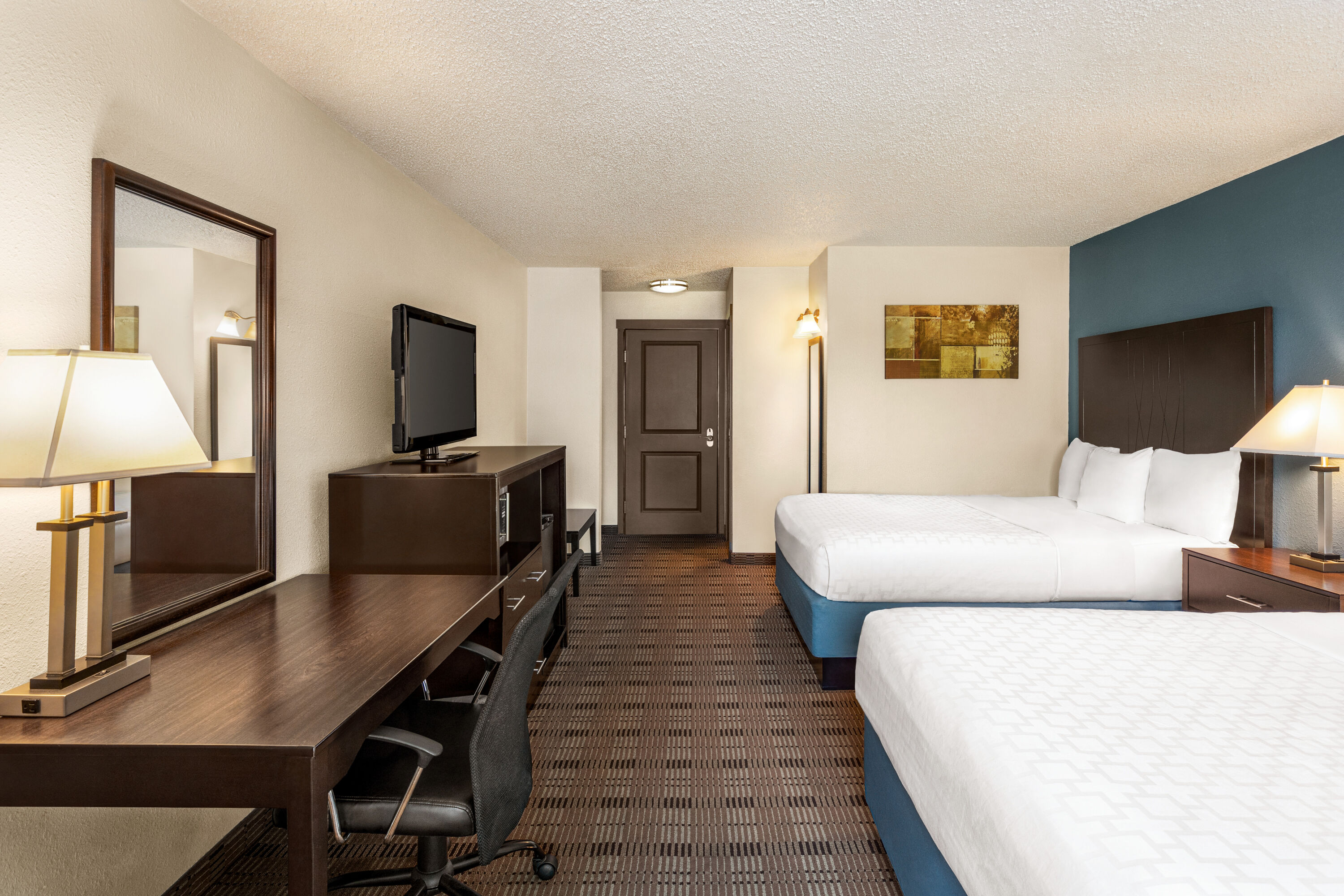 Guest room at the AmericInn by Wyndham La Crosse Riverfront Conference Center in La Crosse, Wisconsin