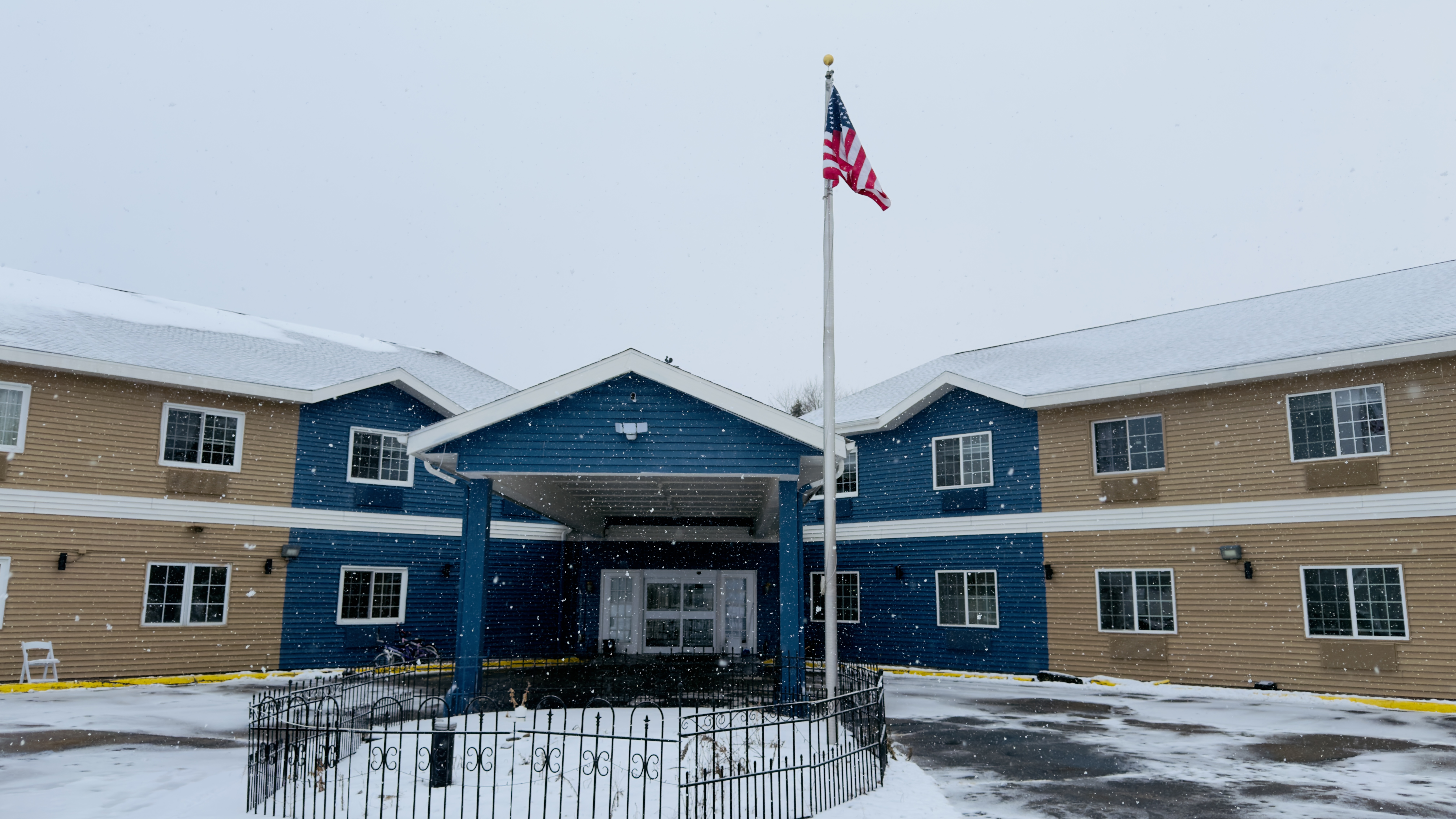 Exterior of AmericInn by Wyndham Lake Mills hotel in Lake Mills, Wisconsin