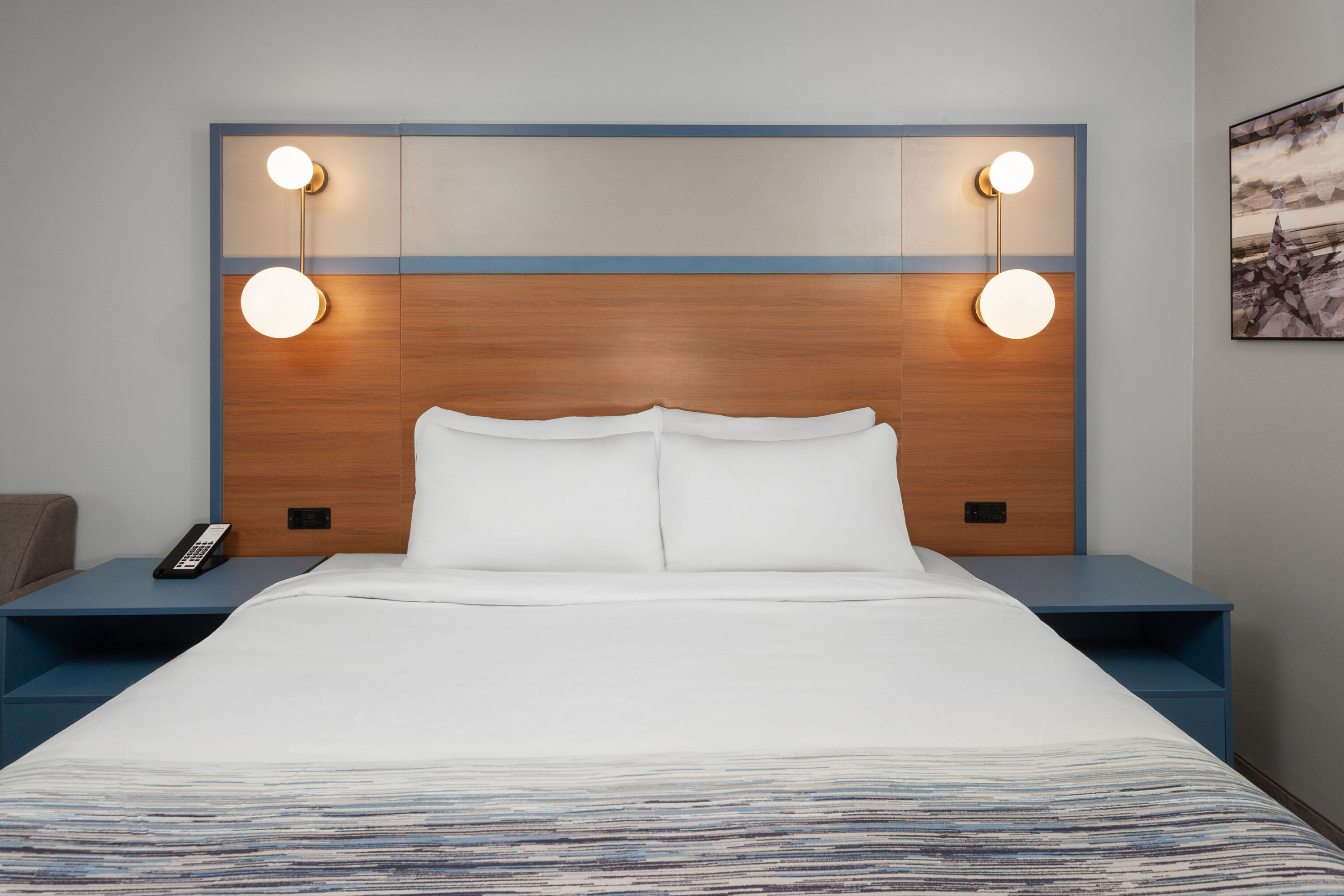 Guest room at the AmericInn by Wyndham Lake Mills in Lake Mills, Wisconsin