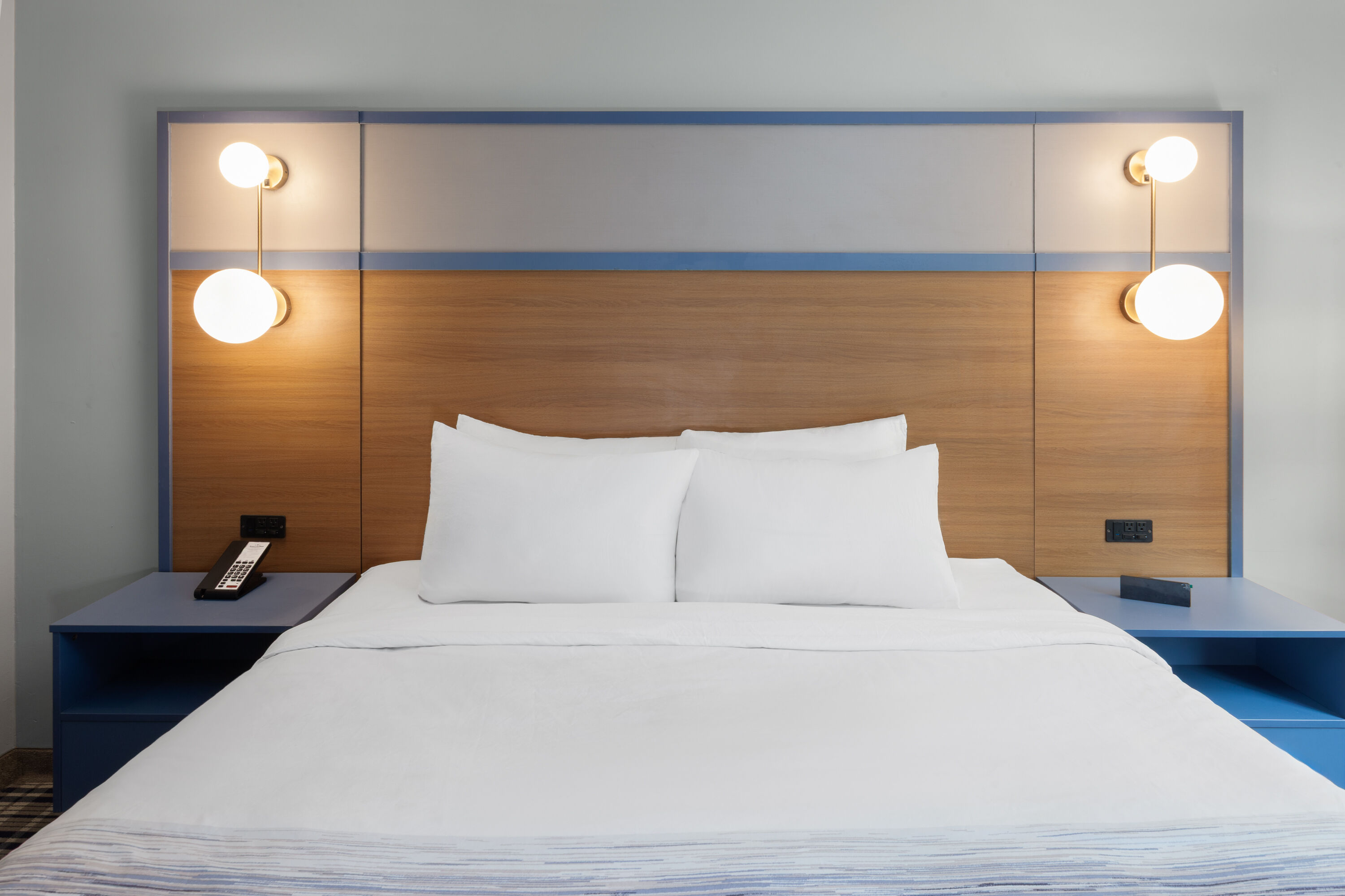 Guest room at the AmericInn by Wyndham Lake Mills in Lake Mills, Wisconsin