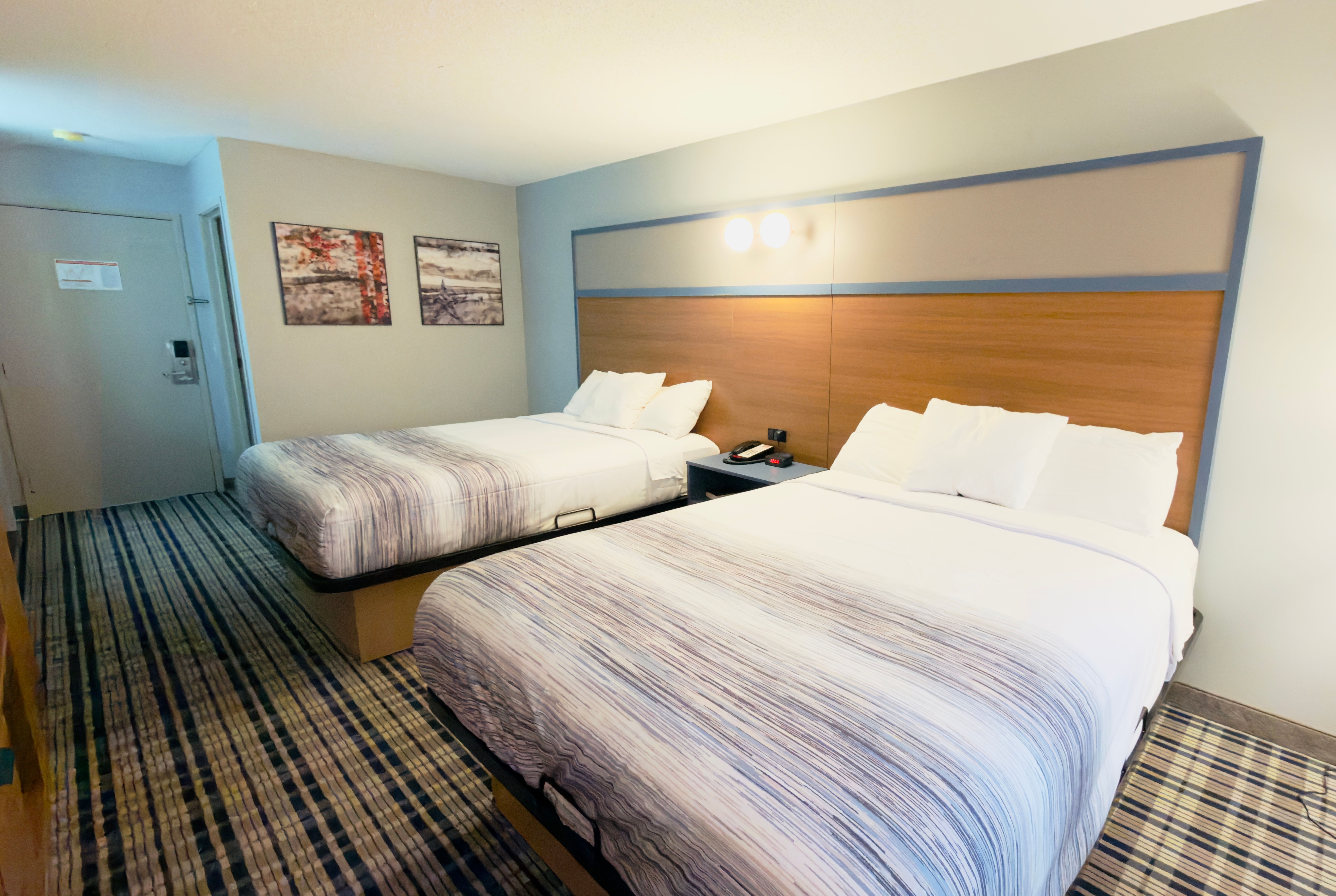 Guest room at the AmericInn by Wyndham Lake Mills in Lake Mills, Wisconsin
