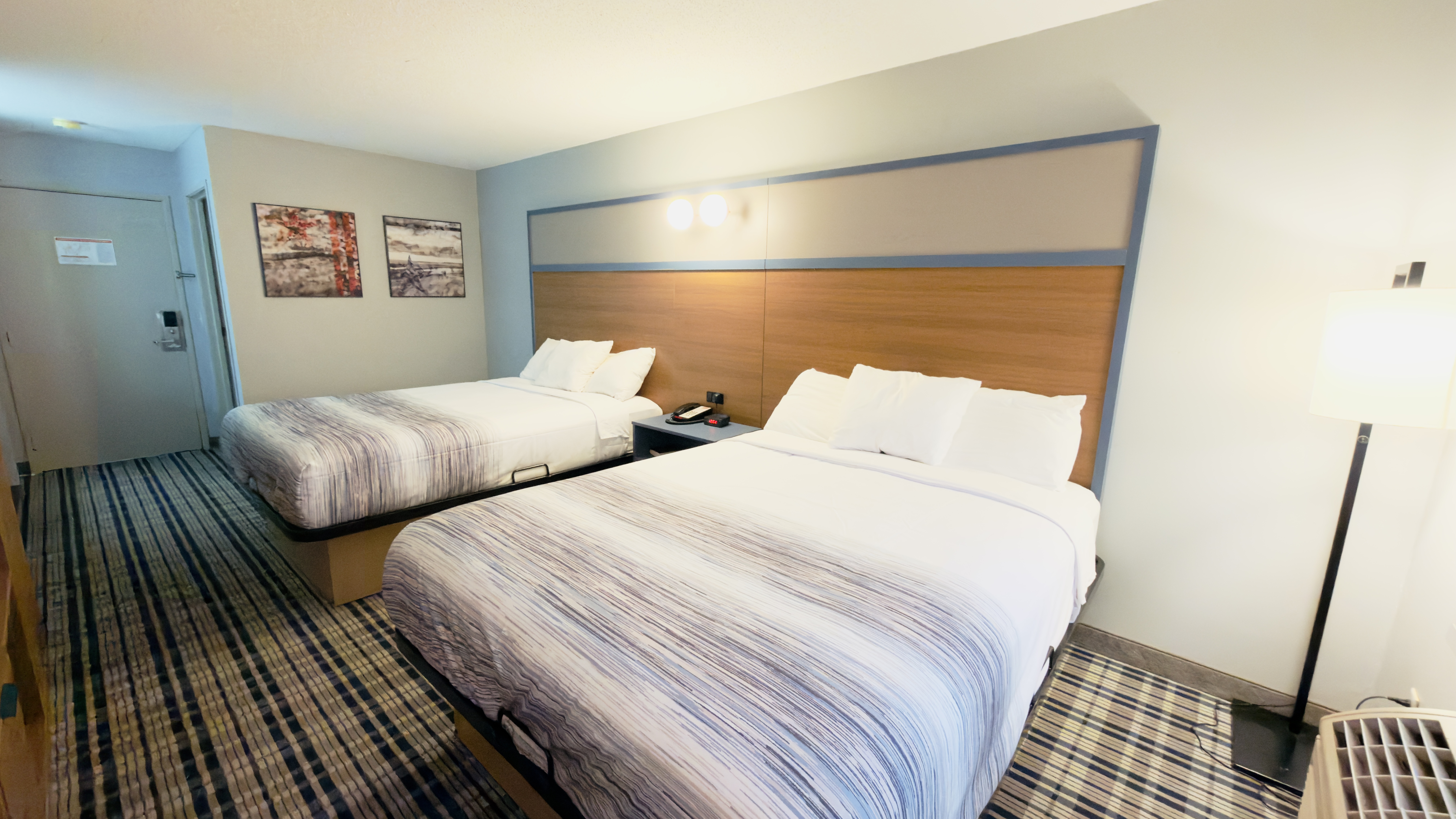 Guest room at the AmericInn by Wyndham Lake Mills in Lake Mills, Wisconsin