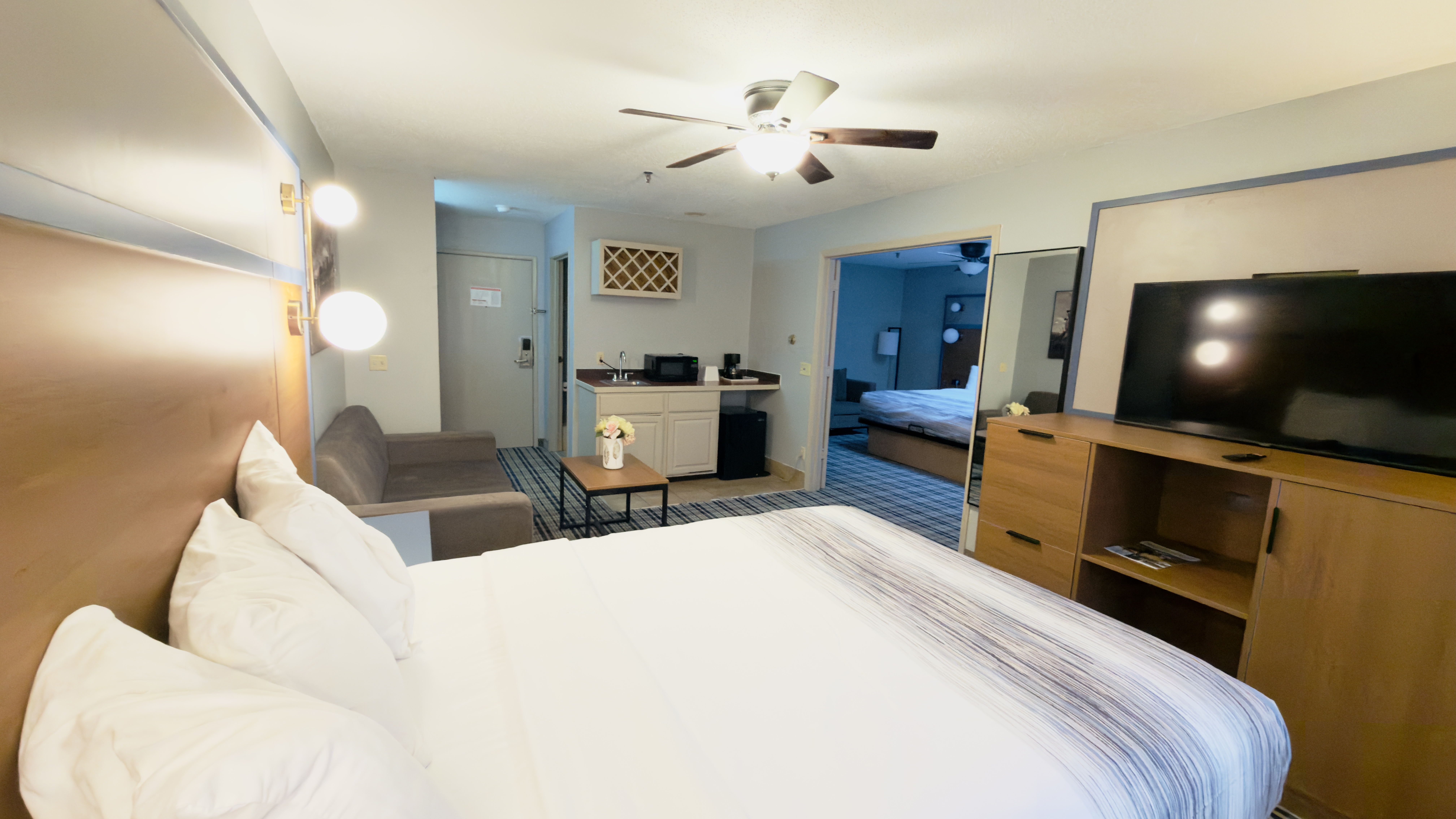 Guest room at the AmericInn by Wyndham Lake Mills in Lake Mills, Wisconsin