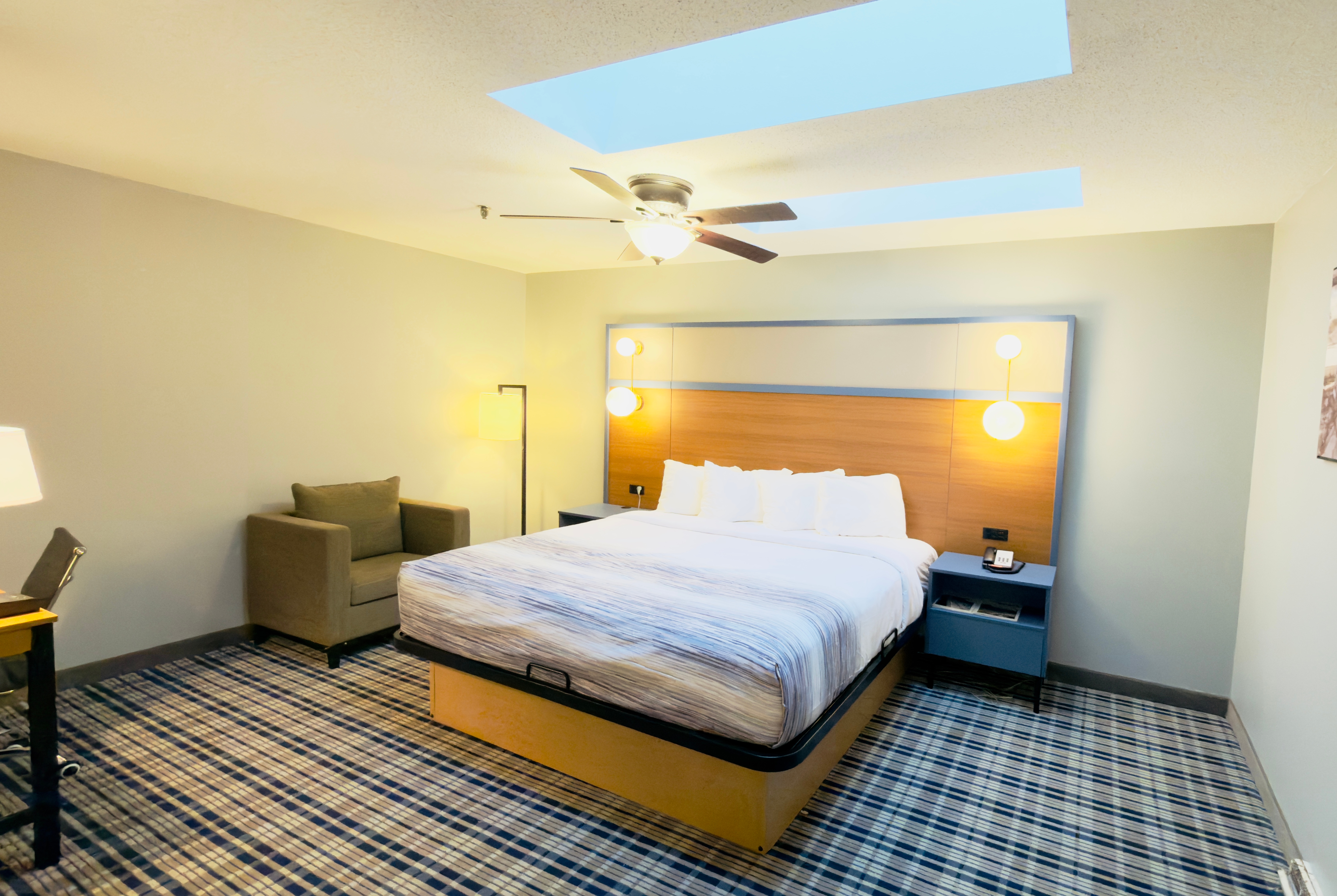 Guest room at the AmericInn by Wyndham Lake Mills in Lake Mills, Wisconsin