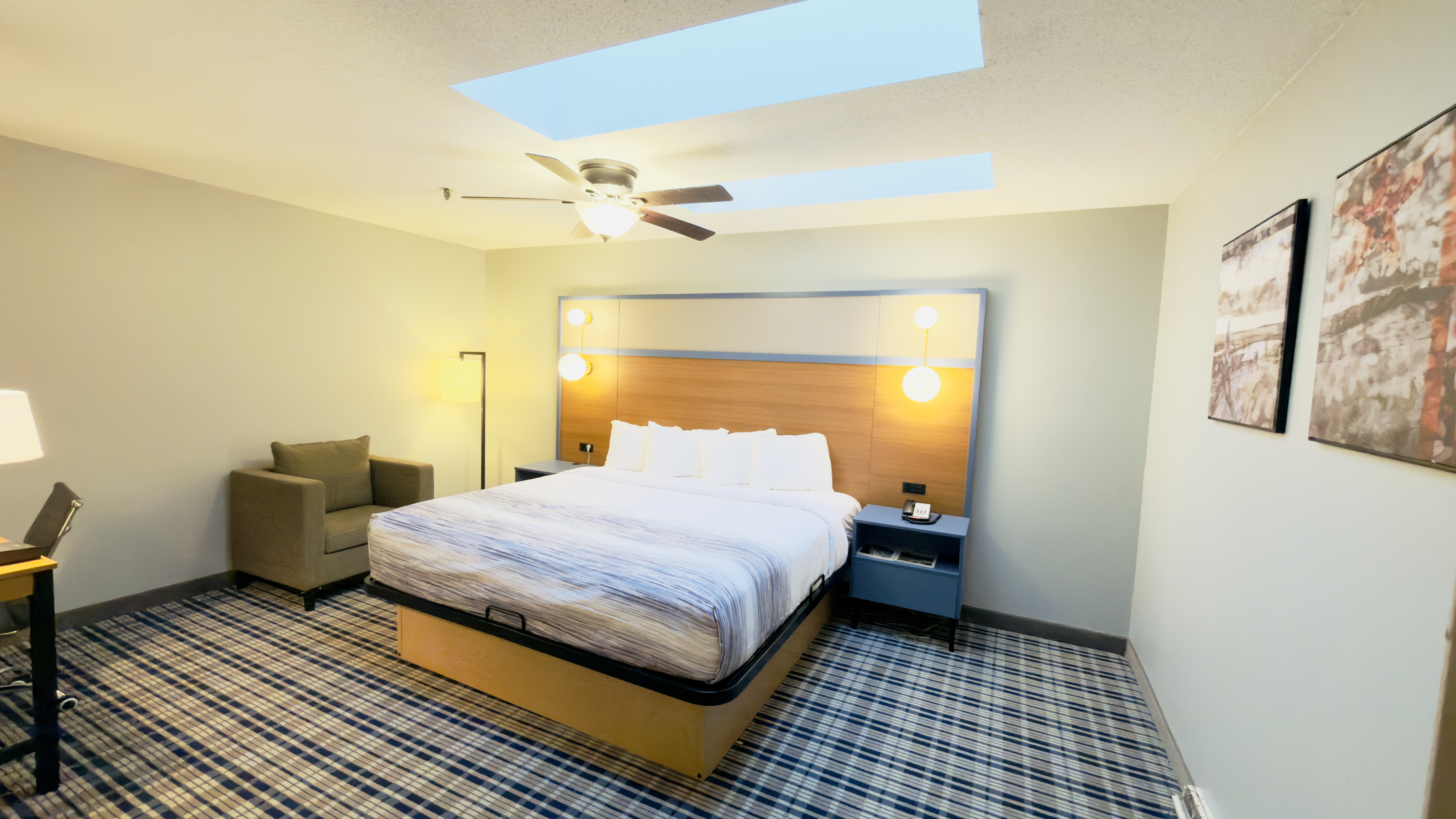 Guest room at the AmericInn by Wyndham Lake Mills in Lake Mills, Wisconsin
