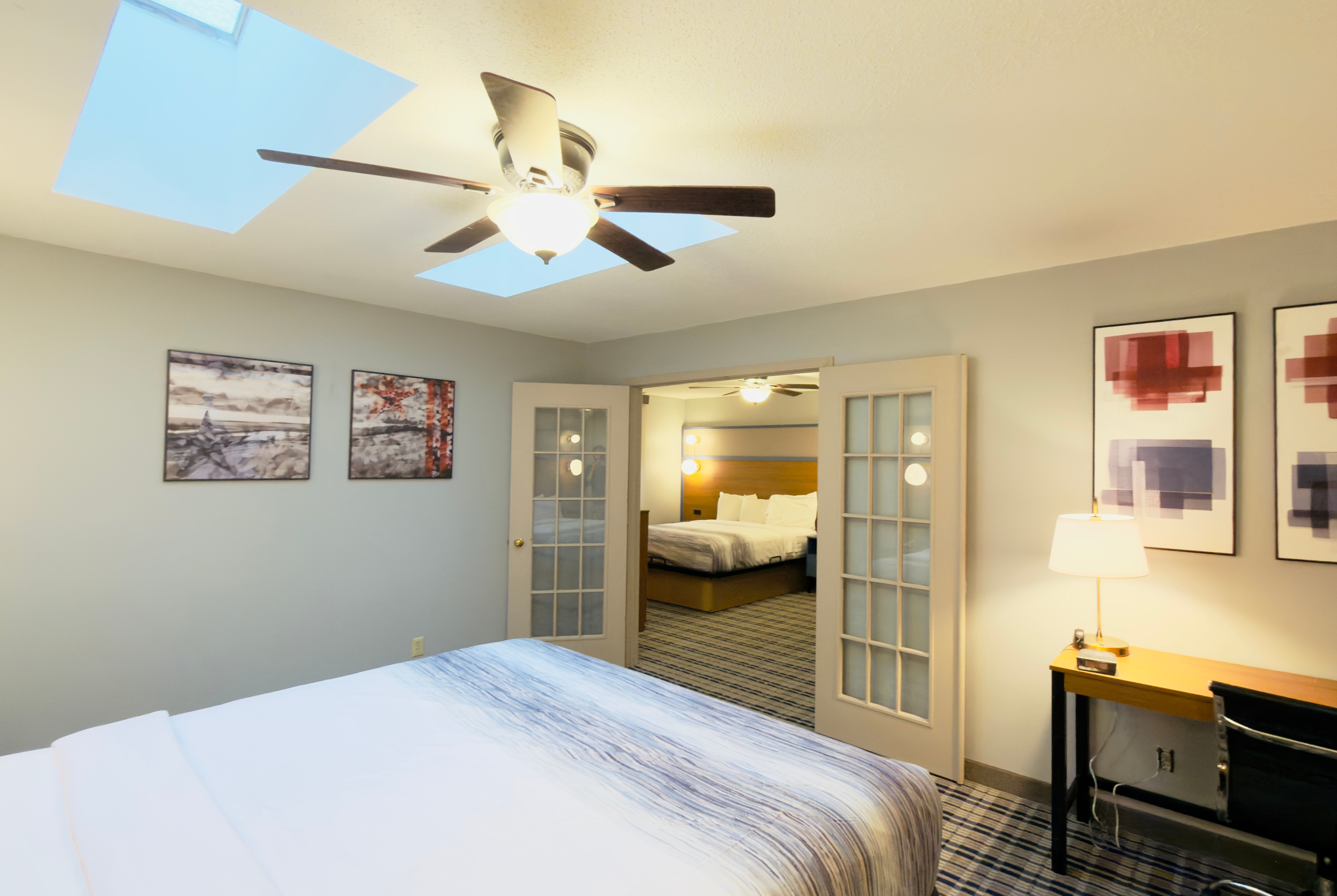 Guest room at the AmericInn by Wyndham Lake Mills in Lake Mills, Wisconsin