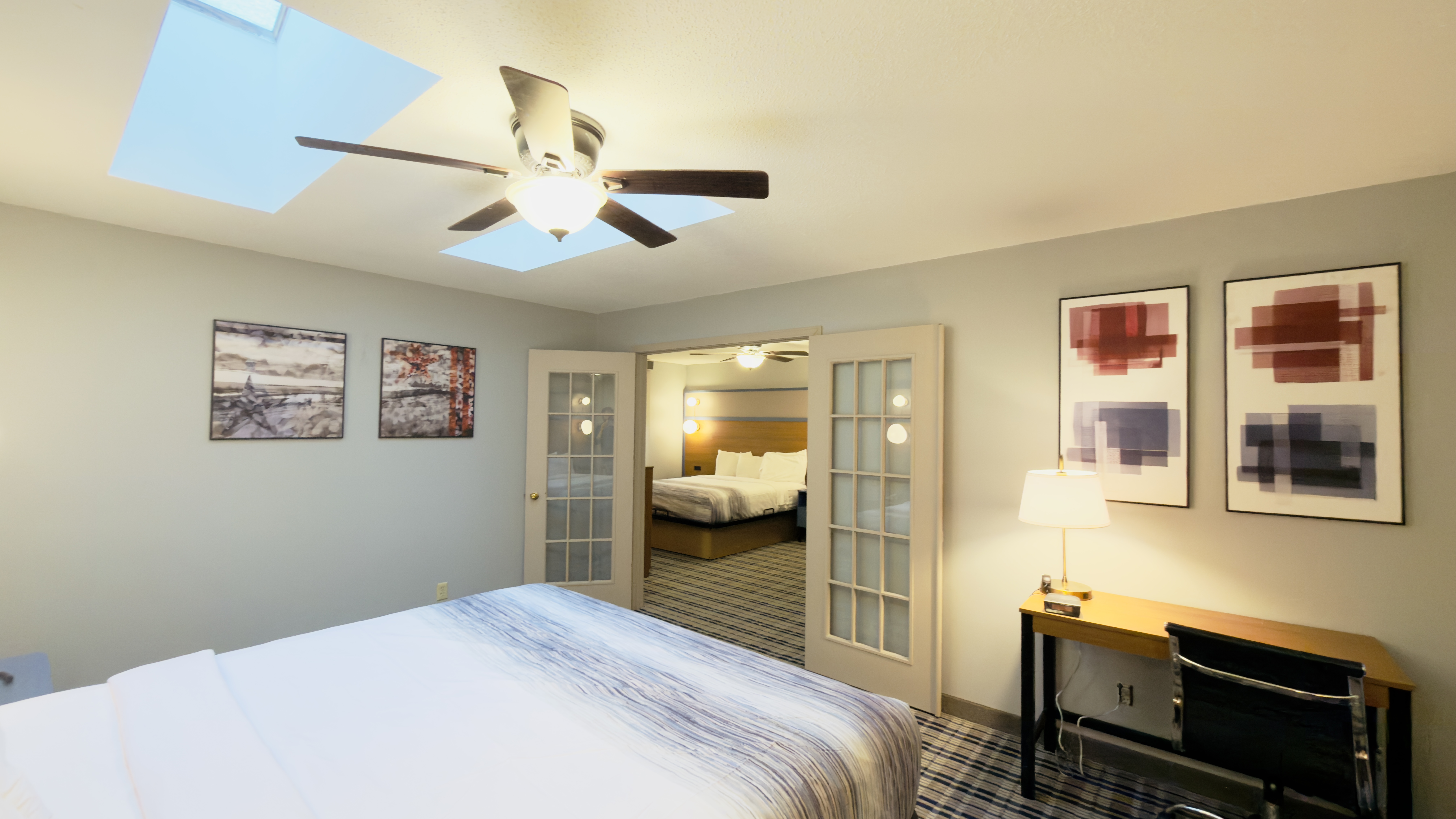 Guest room at the AmericInn by Wyndham Lake Mills in Lake Mills, Wisconsin