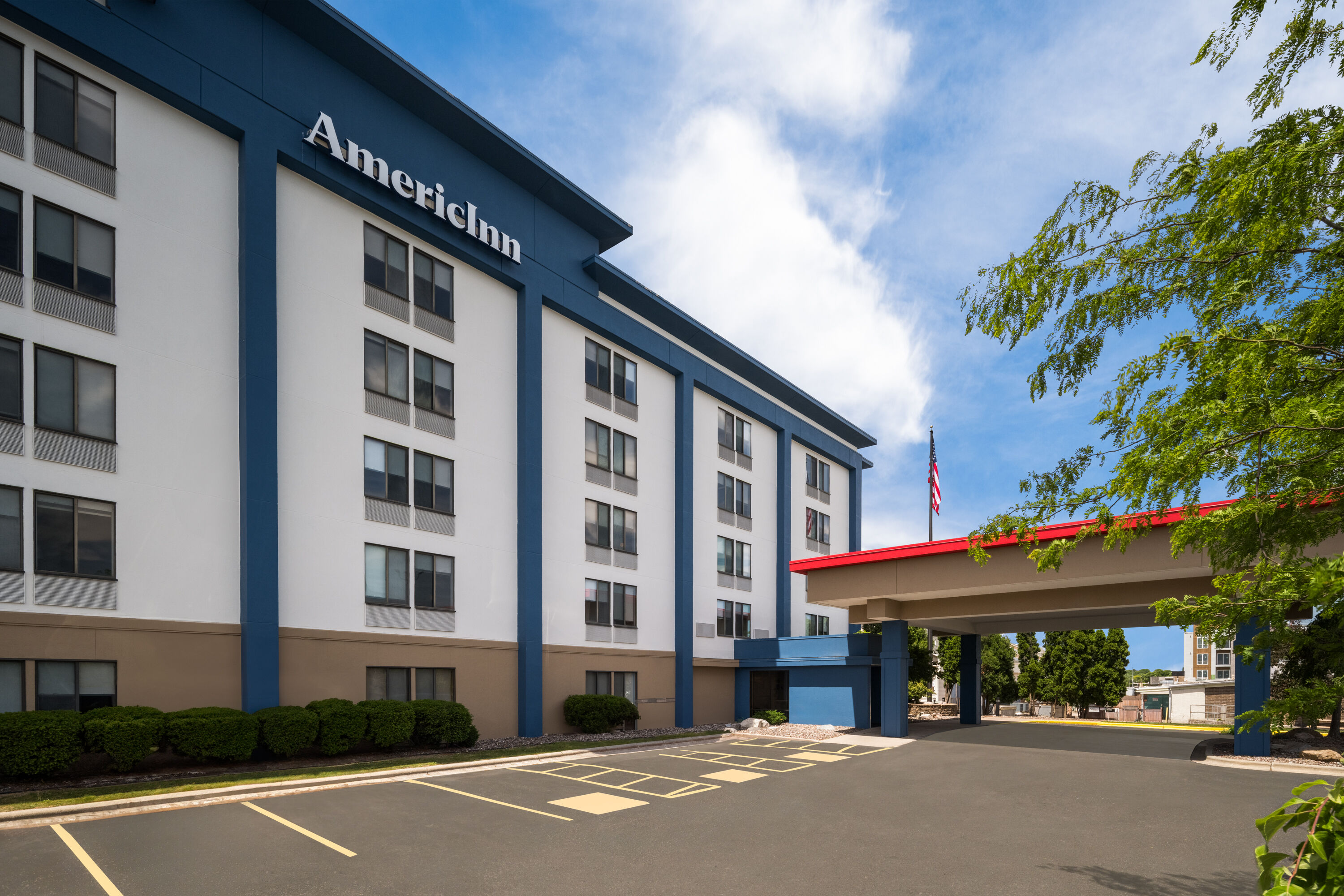 Exterior Day Image of AmericInn by Wyndham Madison West hotel in Madison, Wisconsin