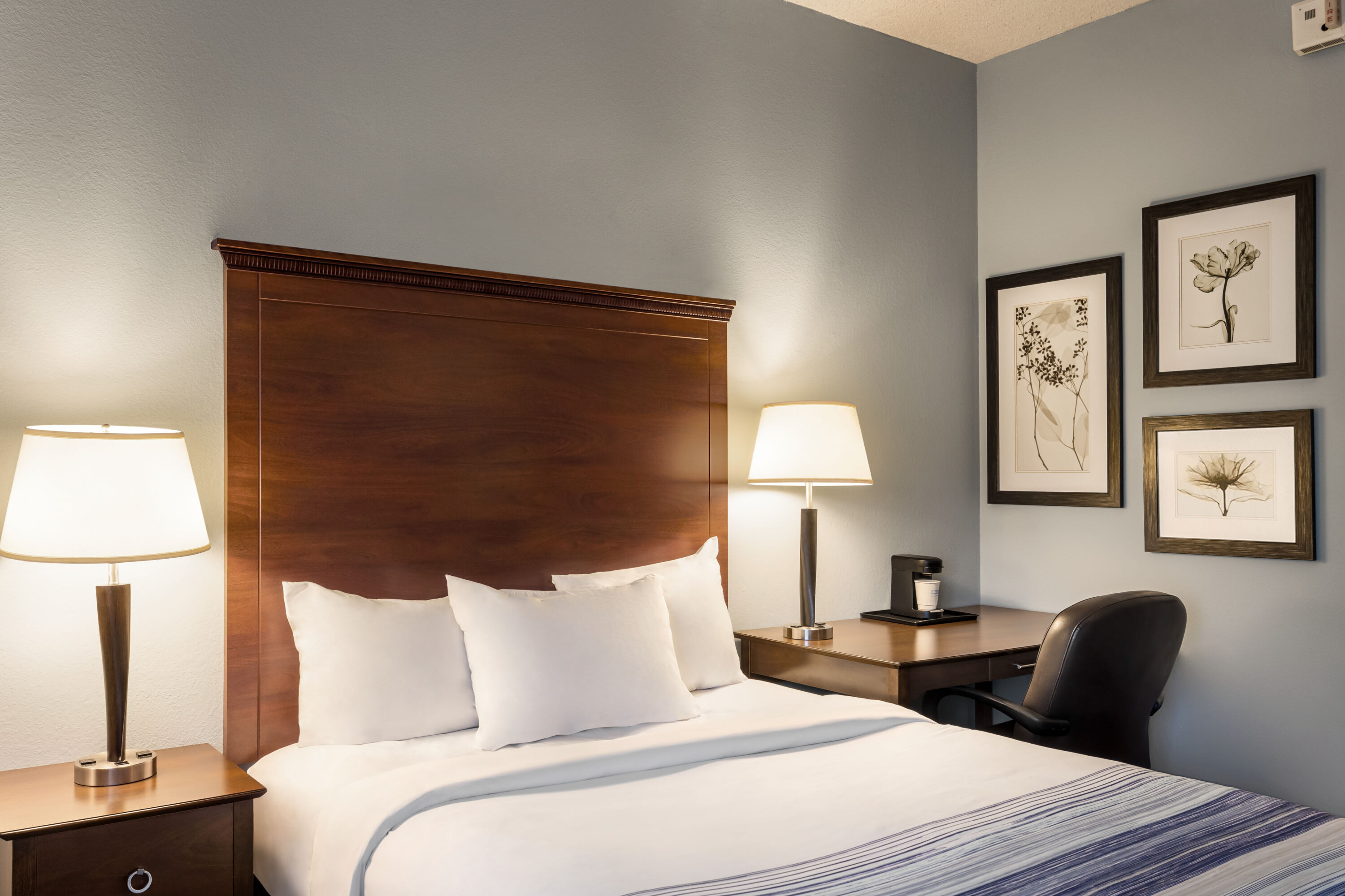 Guest room at the AmericInn by Wyndham Madison West in Madison, Wisconsin