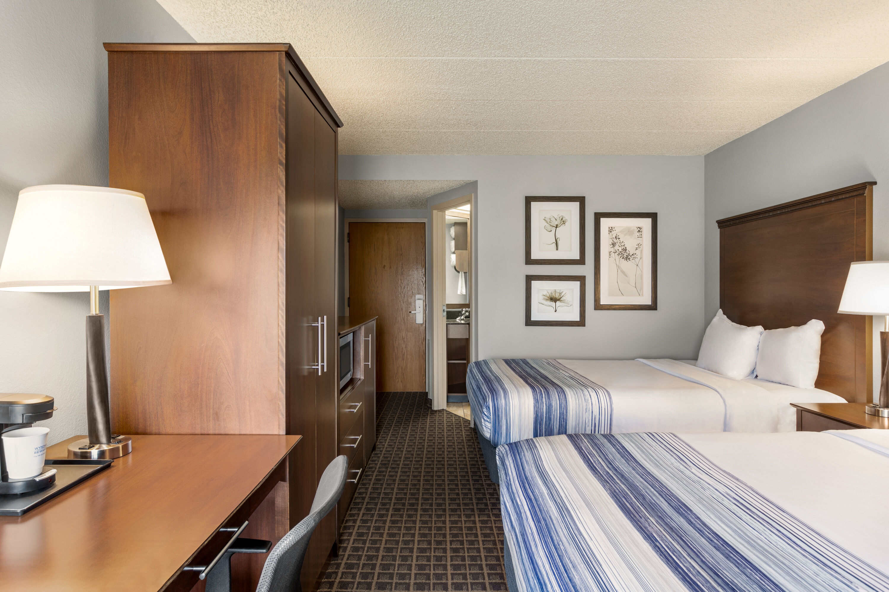 Guest room at the AmericInn by Wyndham Madison West in Madison, Wisconsin