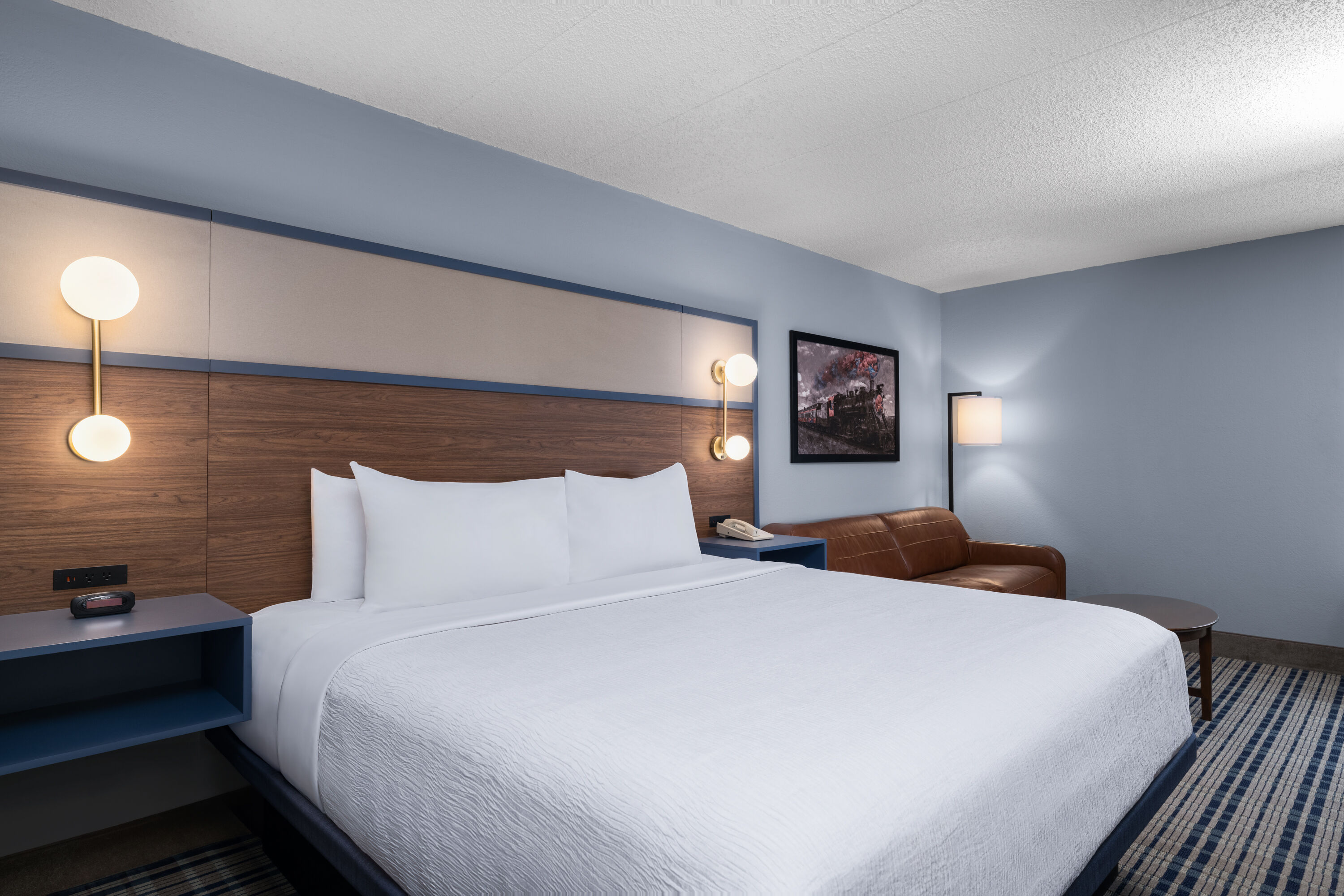 Guest room at the AmericInn by Wyndham Madison West in Madison, Wisconsin