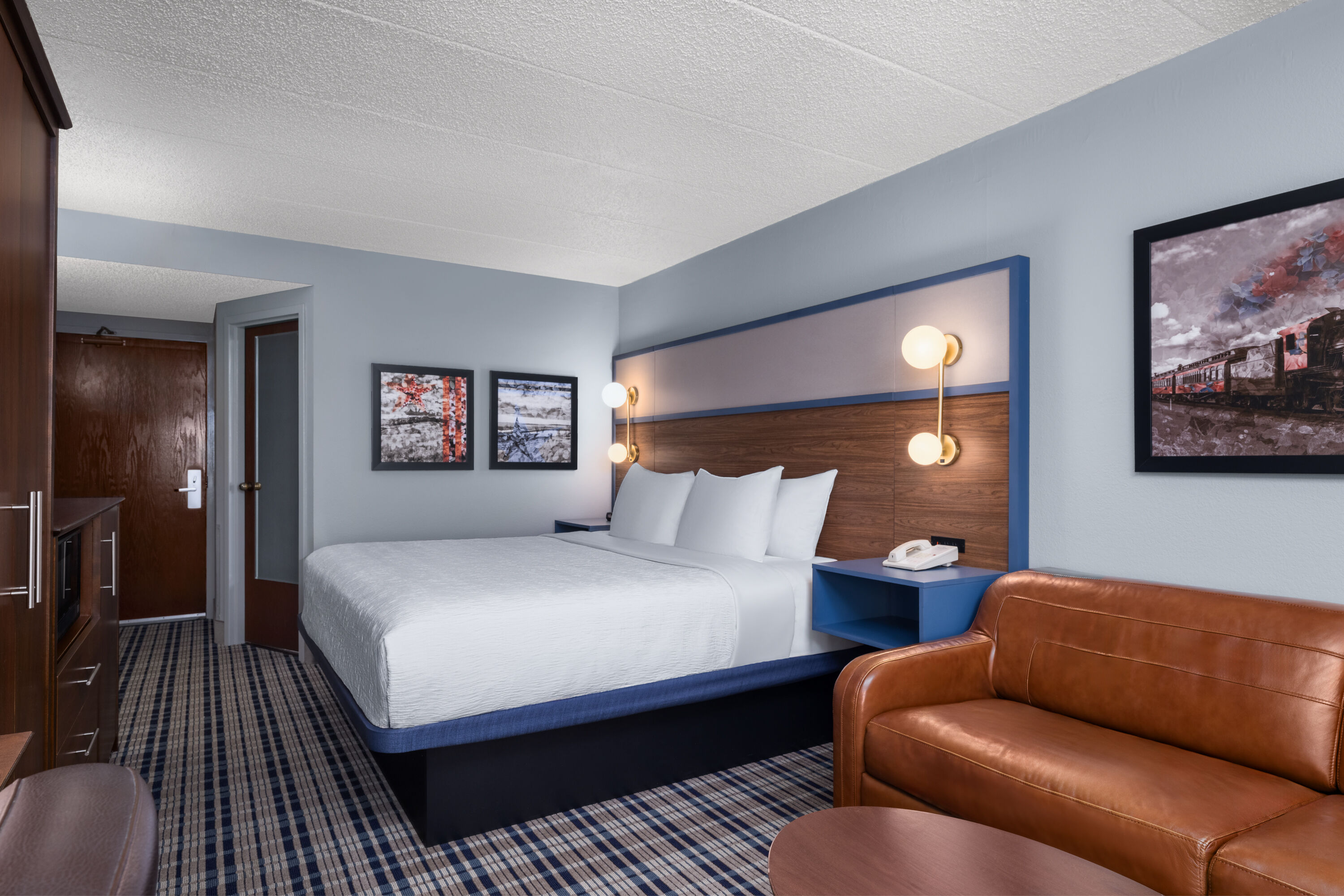 Guest room at the AmericInn by Wyndham Madison West in Madison, Wisconsin