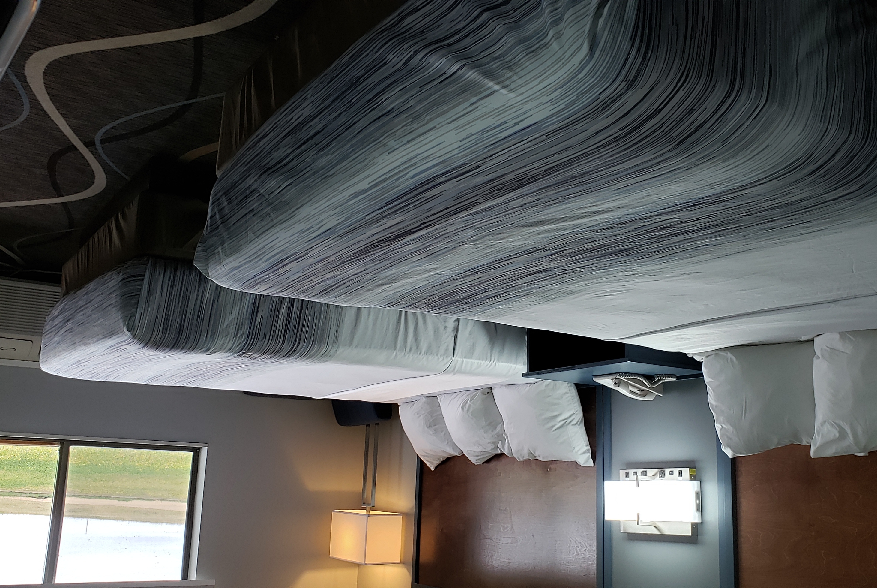 Guest room at the AmericInn by Wyndham Mauston in Mauston, Wisconsin