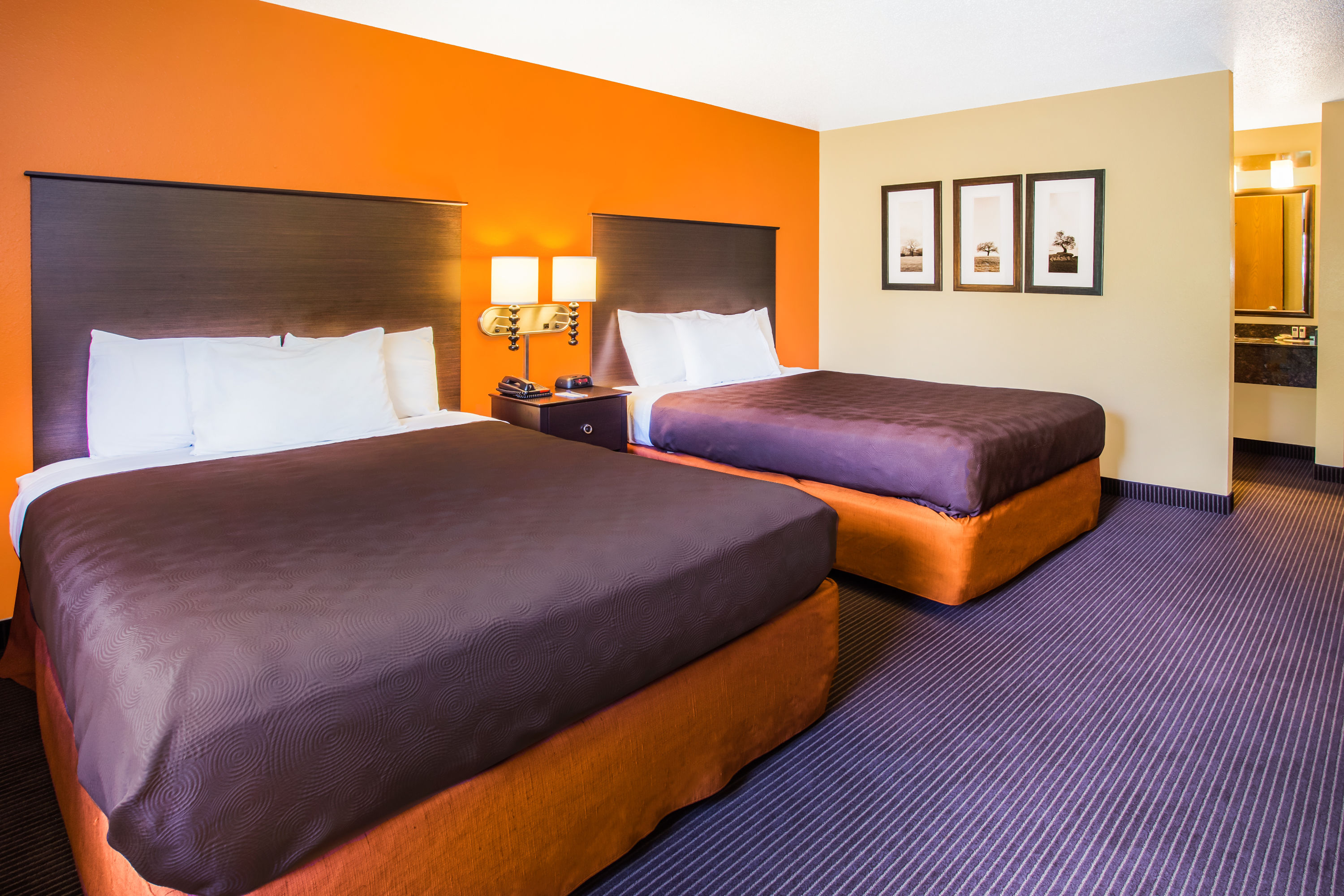 Guest room at the AmericInn by Wyndham Menomonie in Menomonie, Wisconsin