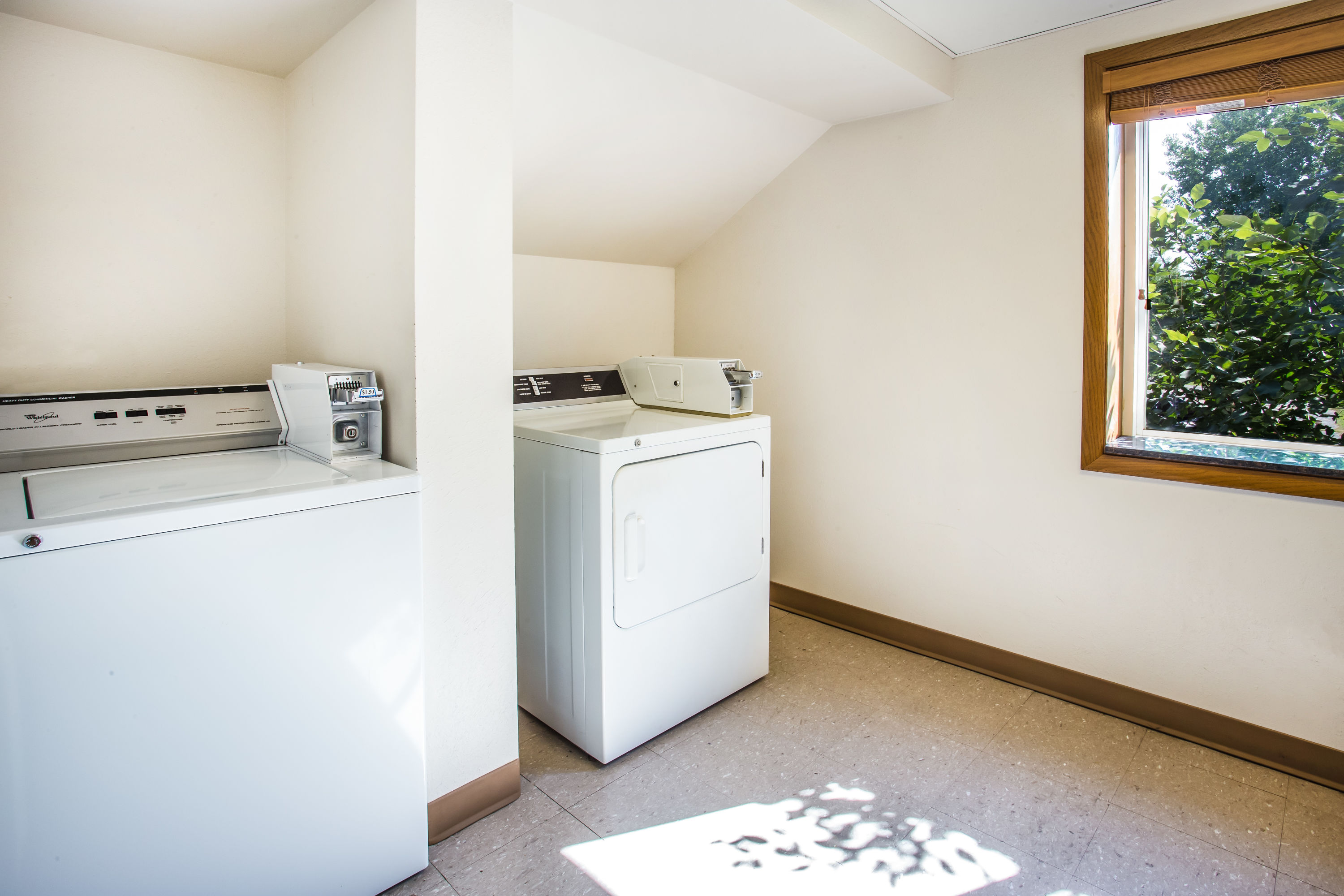 Laundry facilities at AmericInn by Wyndham Menomonie in Menomonie, Wisconsin