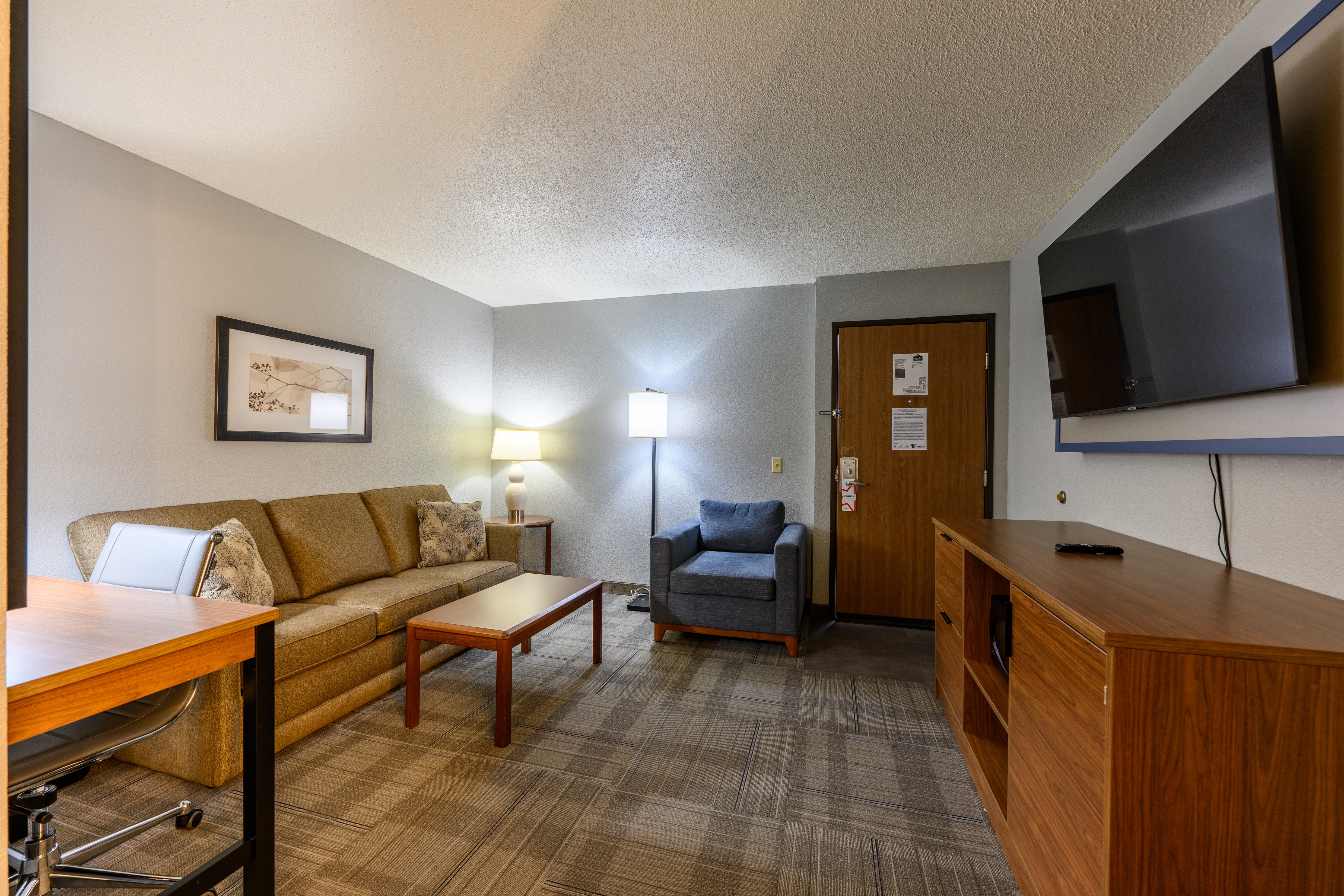 Guest room at the AmericInn by Wyndham Monroe in Monroe, Wisconsin