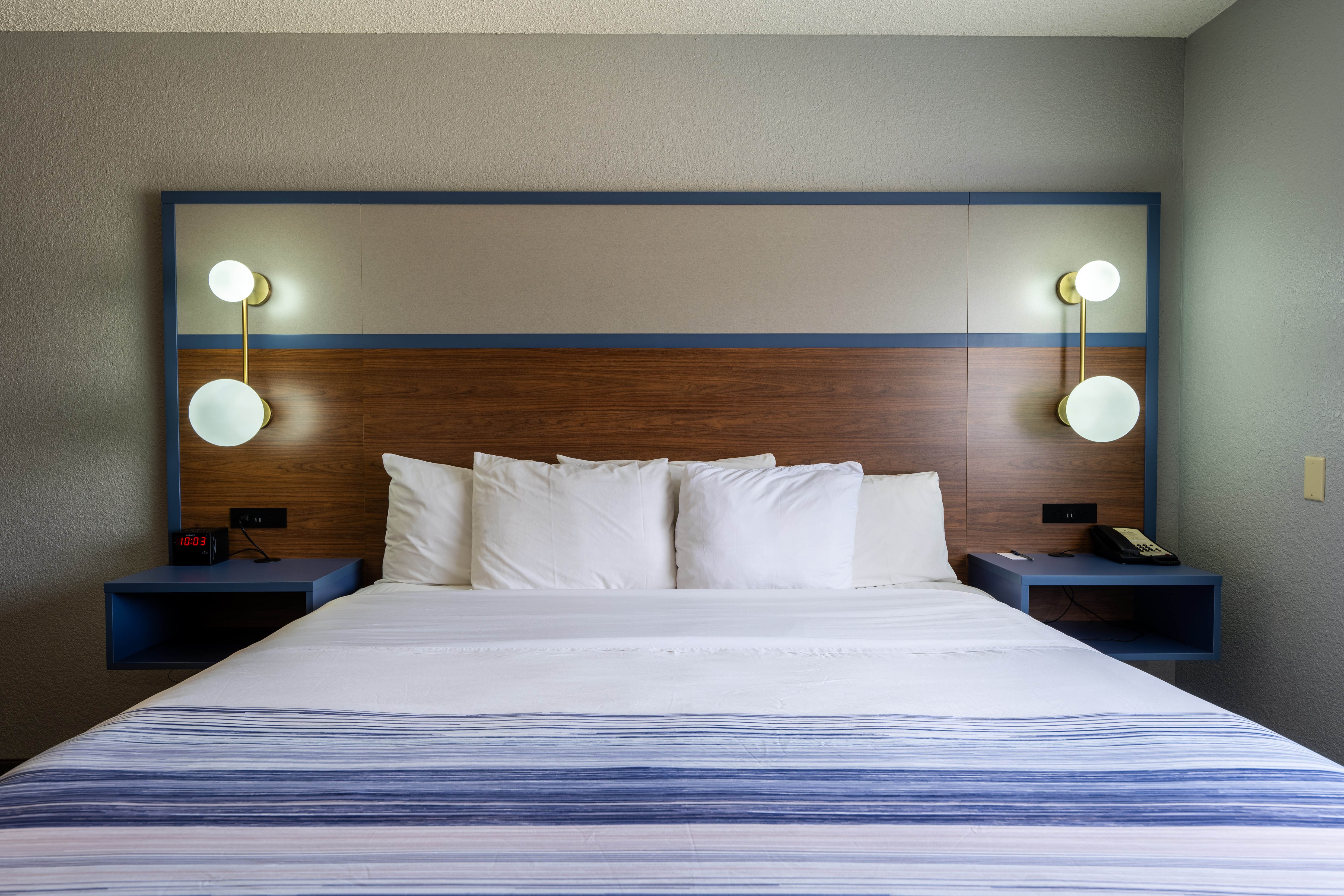 Guest room at the AmericInn by Wyndham Monroe in Monroe, Wisconsin