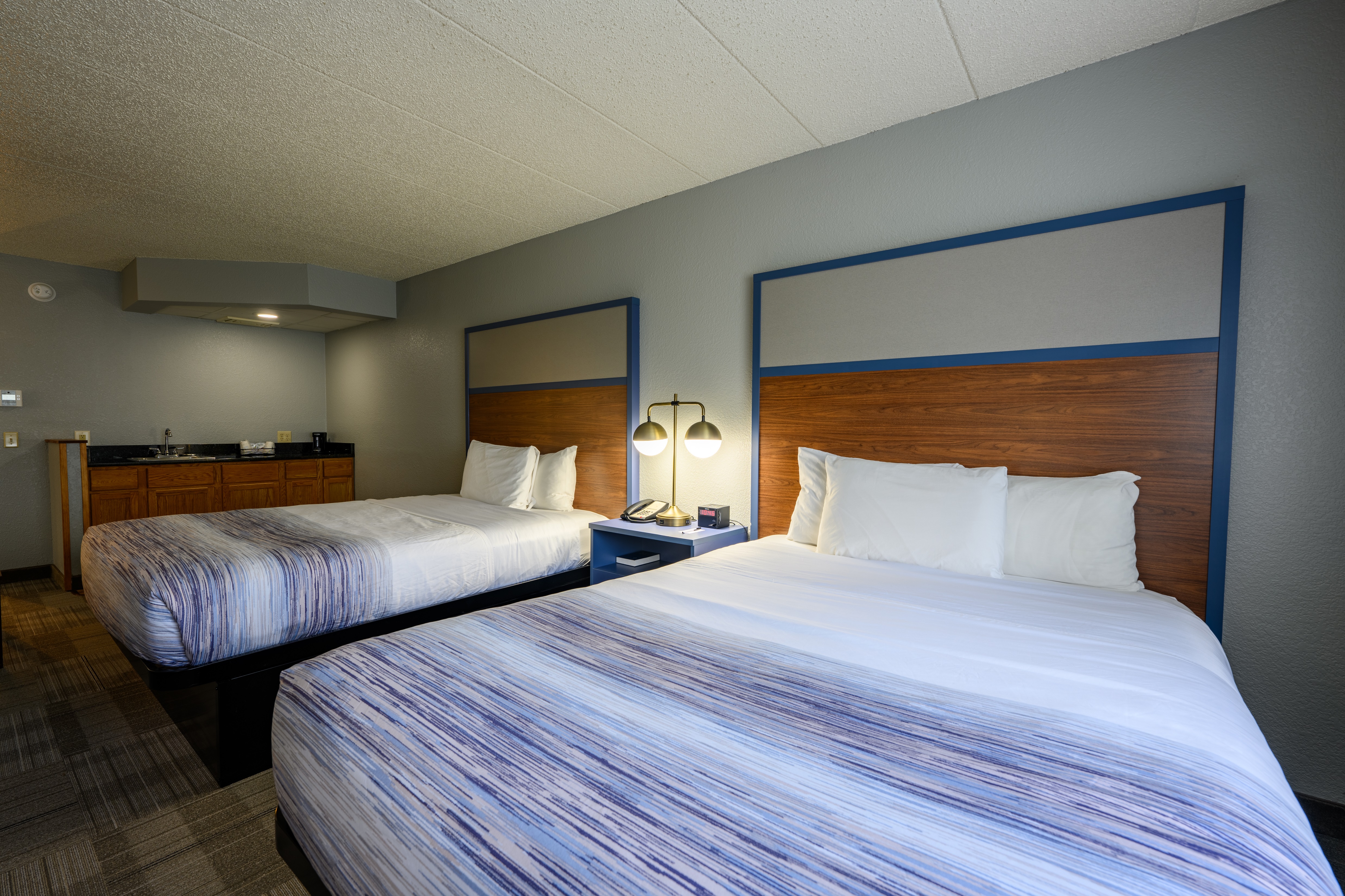 Guest room at the AmericInn by Wyndham Monroe in Monroe, Wisconsin