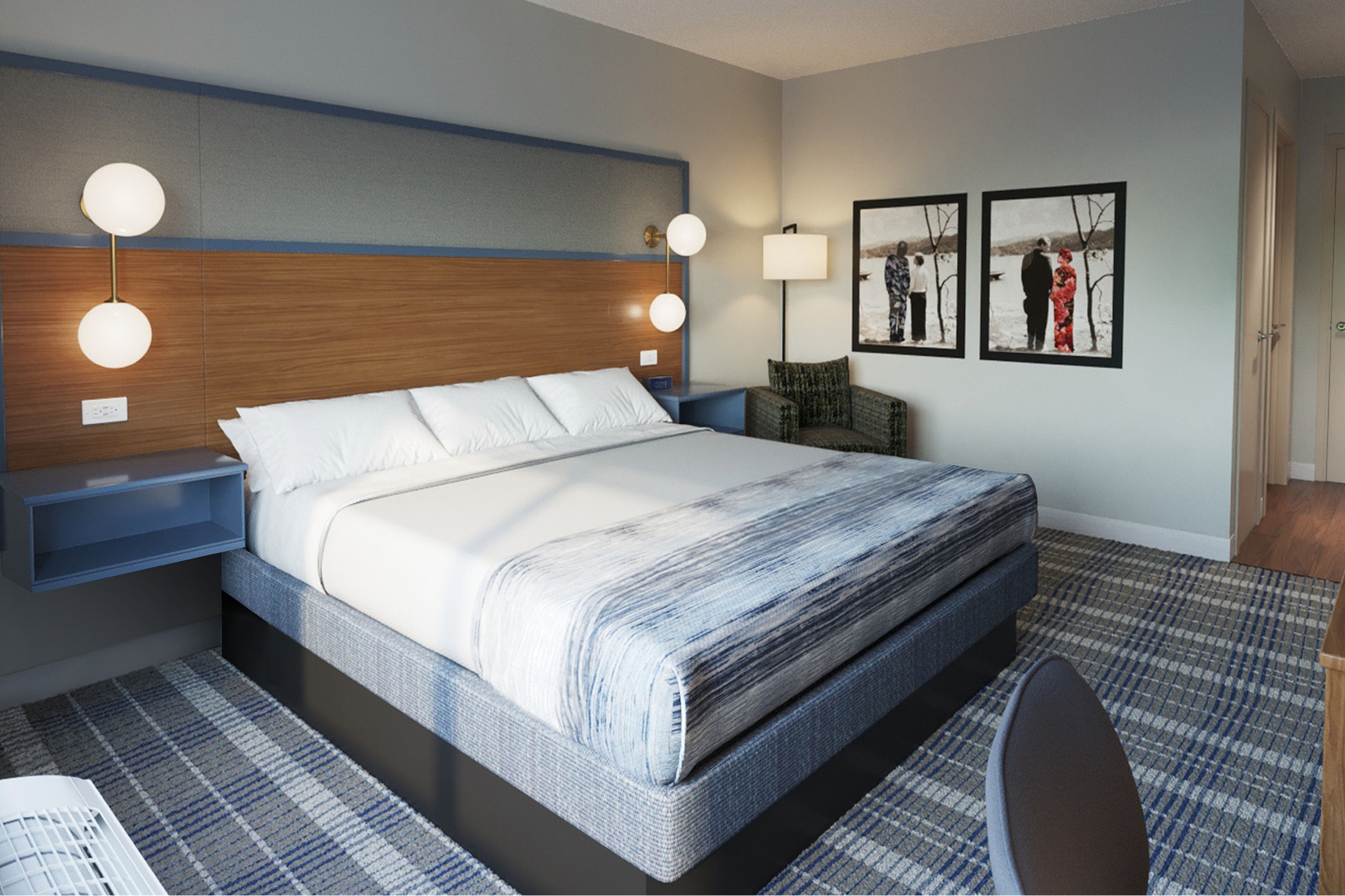 Guest room at the AmericInn by Wyndham Monroe in Monroe, Wisconsin