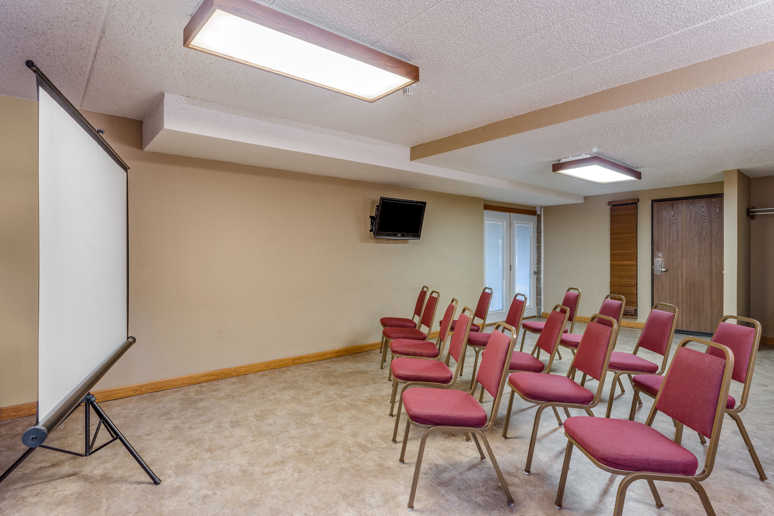 Meeting room at AmericInn by Wyndham Monroe in Monroe, Wisconsin