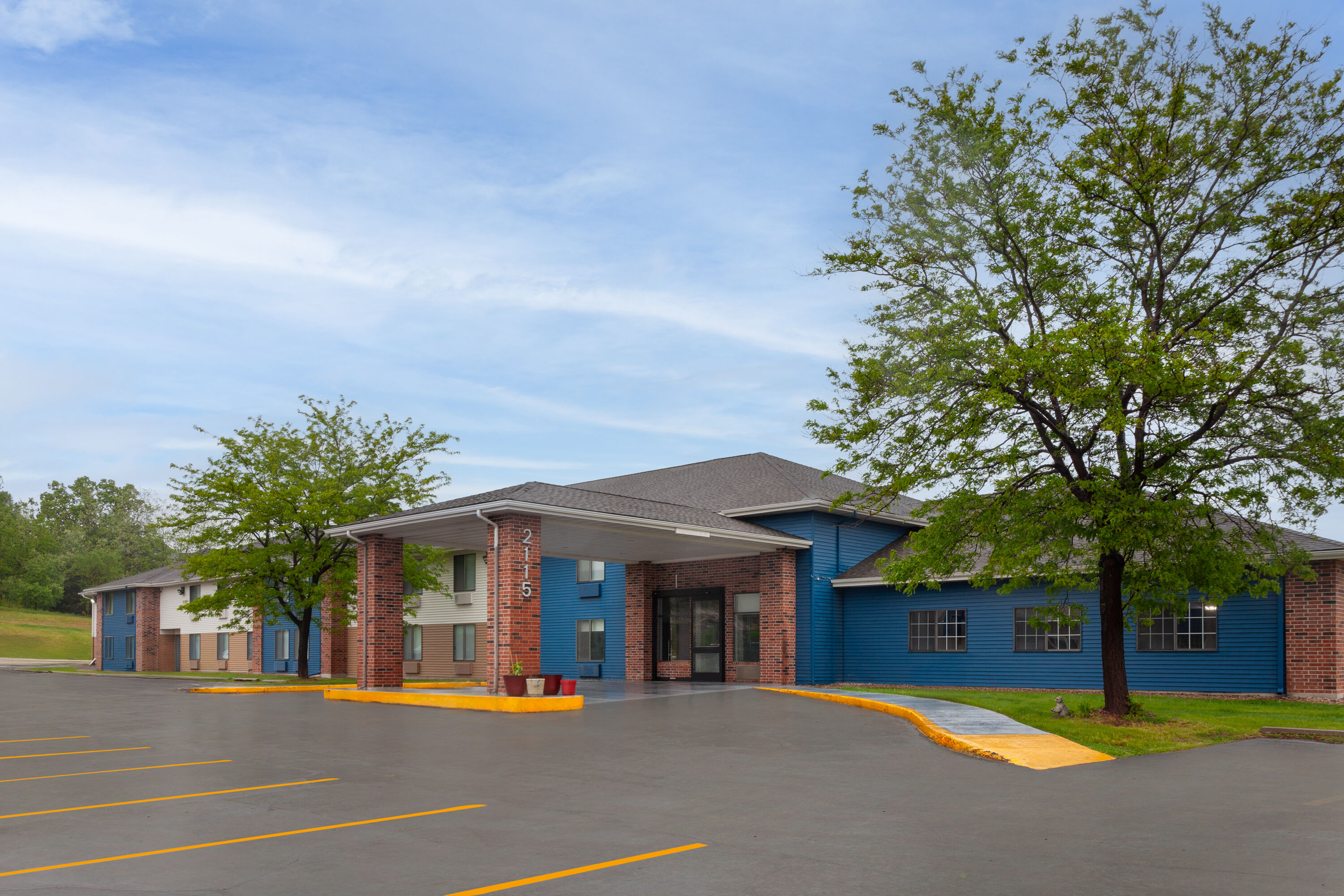 Exterior Day Image of AmericInn by Wyndham Reedsburg hotel in Reedsburg, Wisconsin